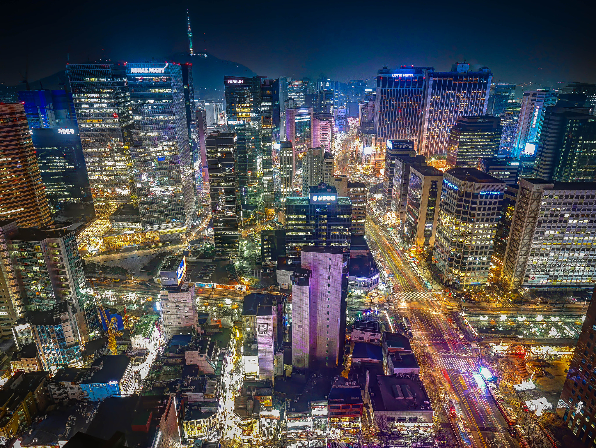 Panasonic Lumix DMC-GX7 + Olympus M.Zuiko Digital ED 7-14mm F2.8 PRO sample photo. City lights in seoul photography