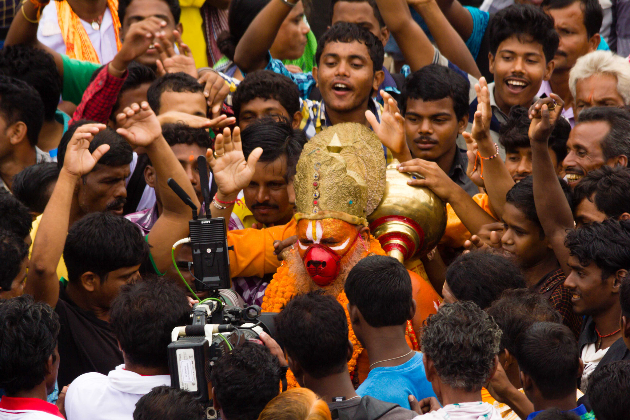 Sigma 150-500mm F5-6.3 DG OS HSM sample photo. Crowds cheering man dressed as monkey god hanuman photography