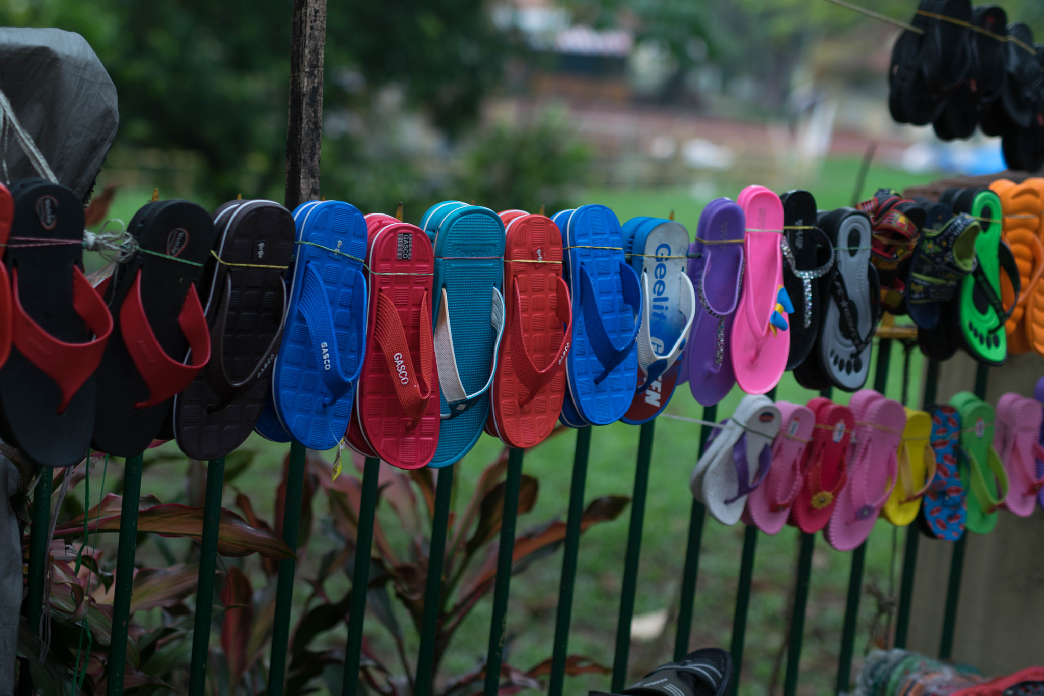 Nikon D5300 + Sigma 50mm F1.4 DG HSM Art sample photo. Roadside flipflop sale photography