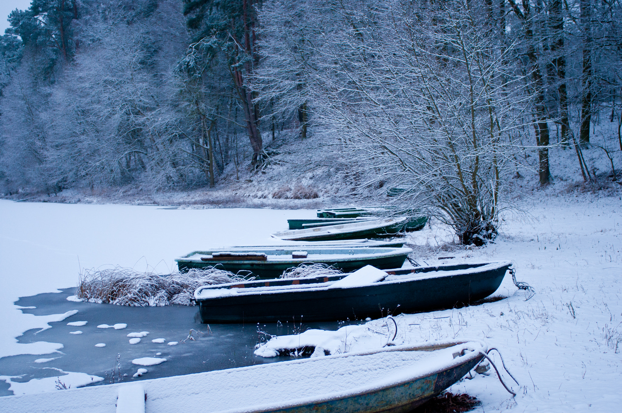 Nikon D300 + Nikon AF Nikkor 28mm F2.8D sample photo. Rowboat ice lake photography