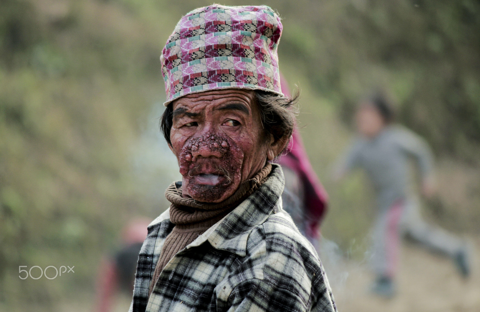 Canon EOS 550D (EOS Rebel T2i / EOS Kiss X4) sample photo. Strange faced man photography