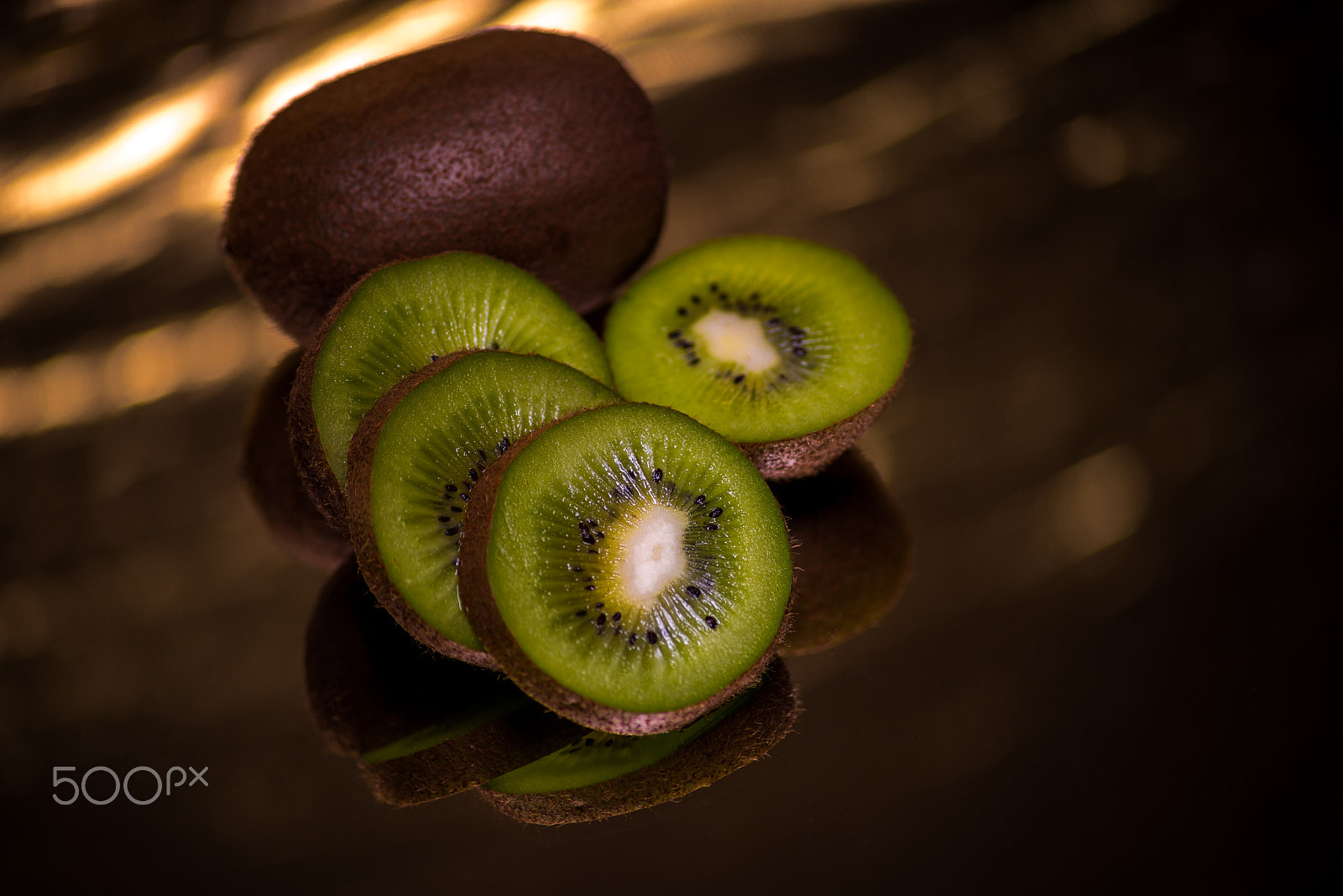 Sony a7R + Sigma 70-300mm F4-5.6 DL Macro sample photo. Kiwi in gold photography