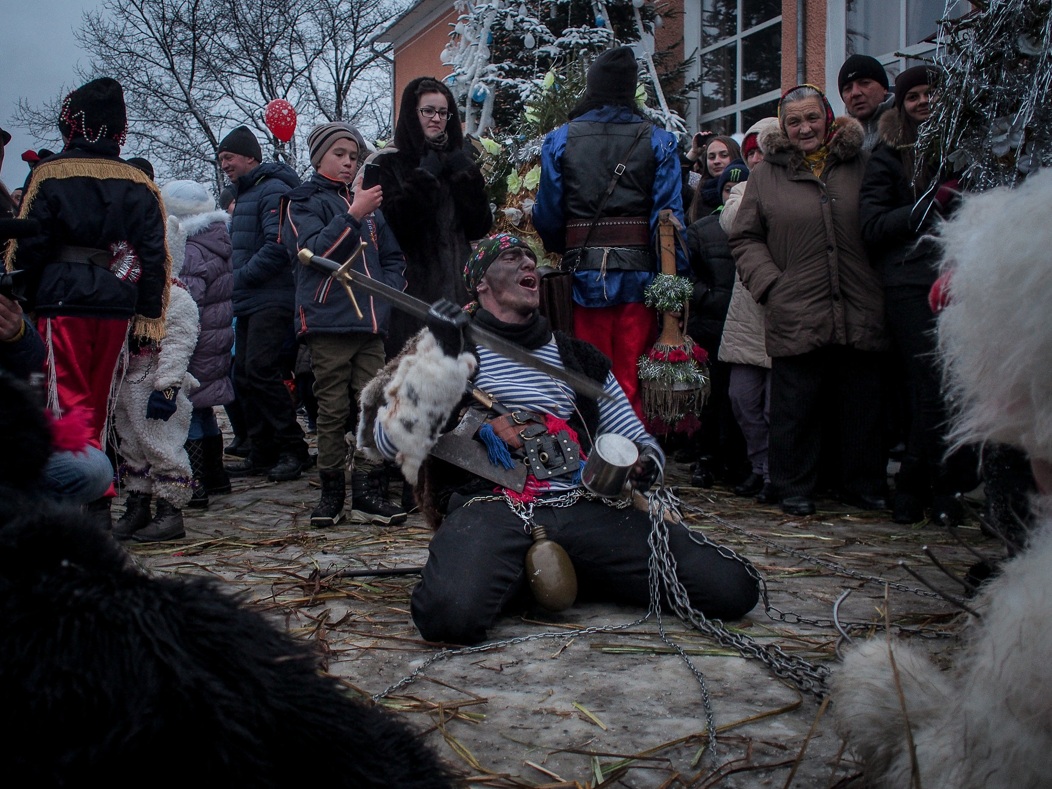 Olympus M.Zuiko Digital 17mm F2.8 Pancake sample photo. Man plays gypsy as he celebrate malanka in krasna photography