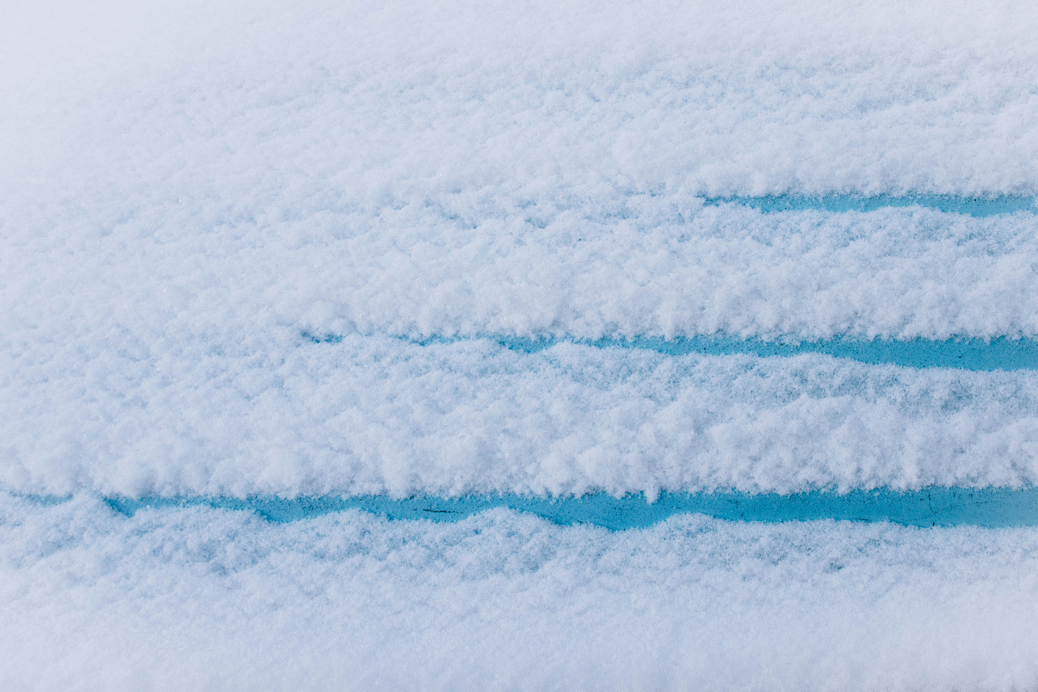 OLYMPUS M.12mm F2.0 Ltd Blk sample photo. Snow on blue boat. photography
