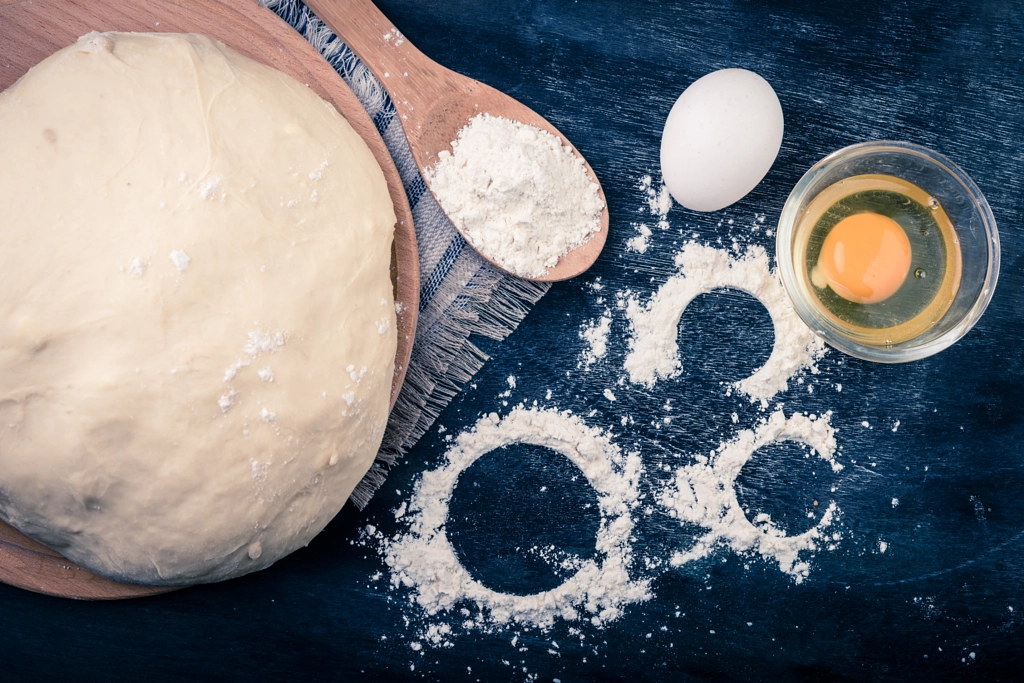 Dough, egg, flour. Selective focus.  Rustic backgr by Elena Pavlovich on 500px.com