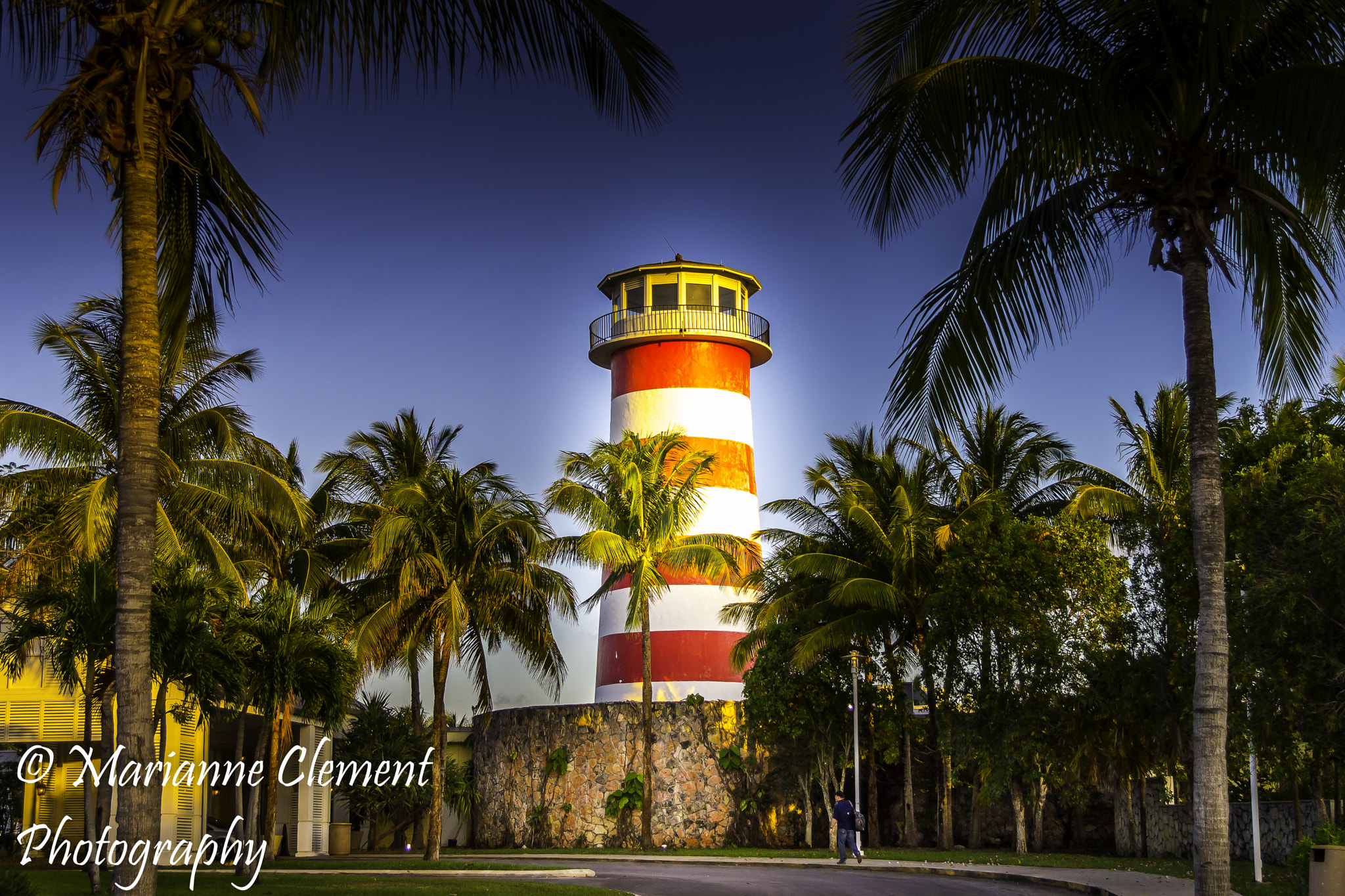 Canon EF-S 17-85mm F4-5.6 IS USM sample photo. Grand lucayan lighthouse at dusk photography
