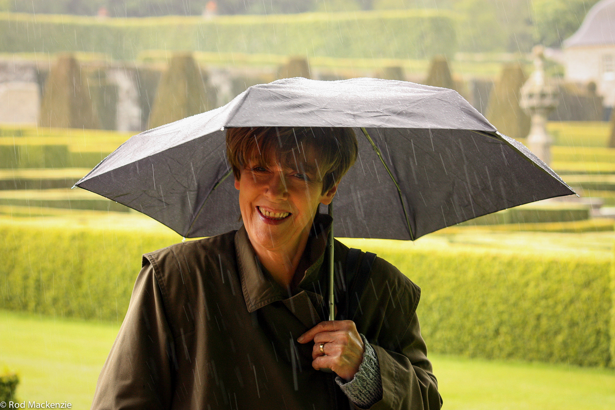 5.6 IS sample photo. Singing in the rain photography