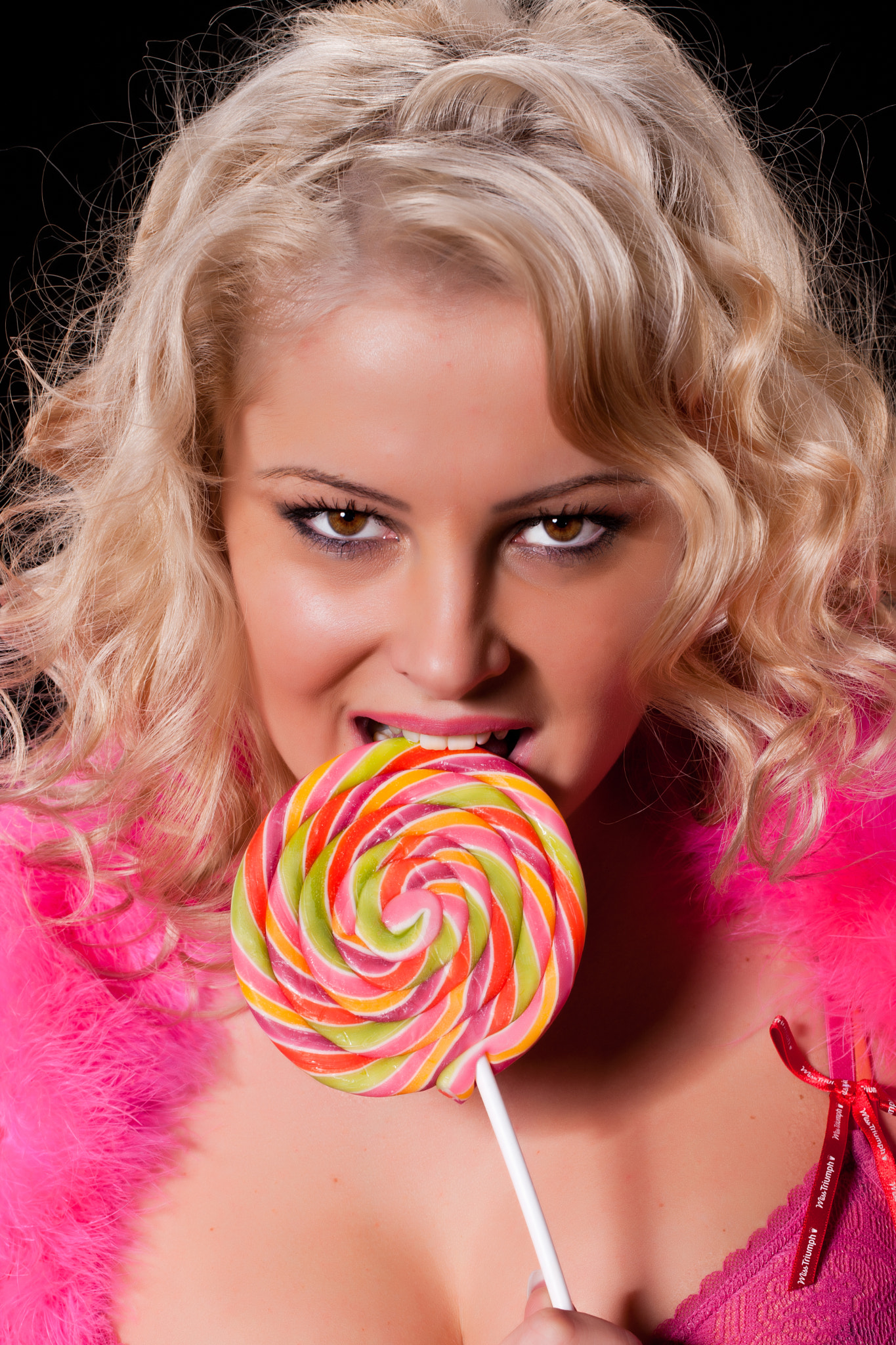 Canon EOS-1Ds Mark III sample photo. Young woman with a lollipop photography
