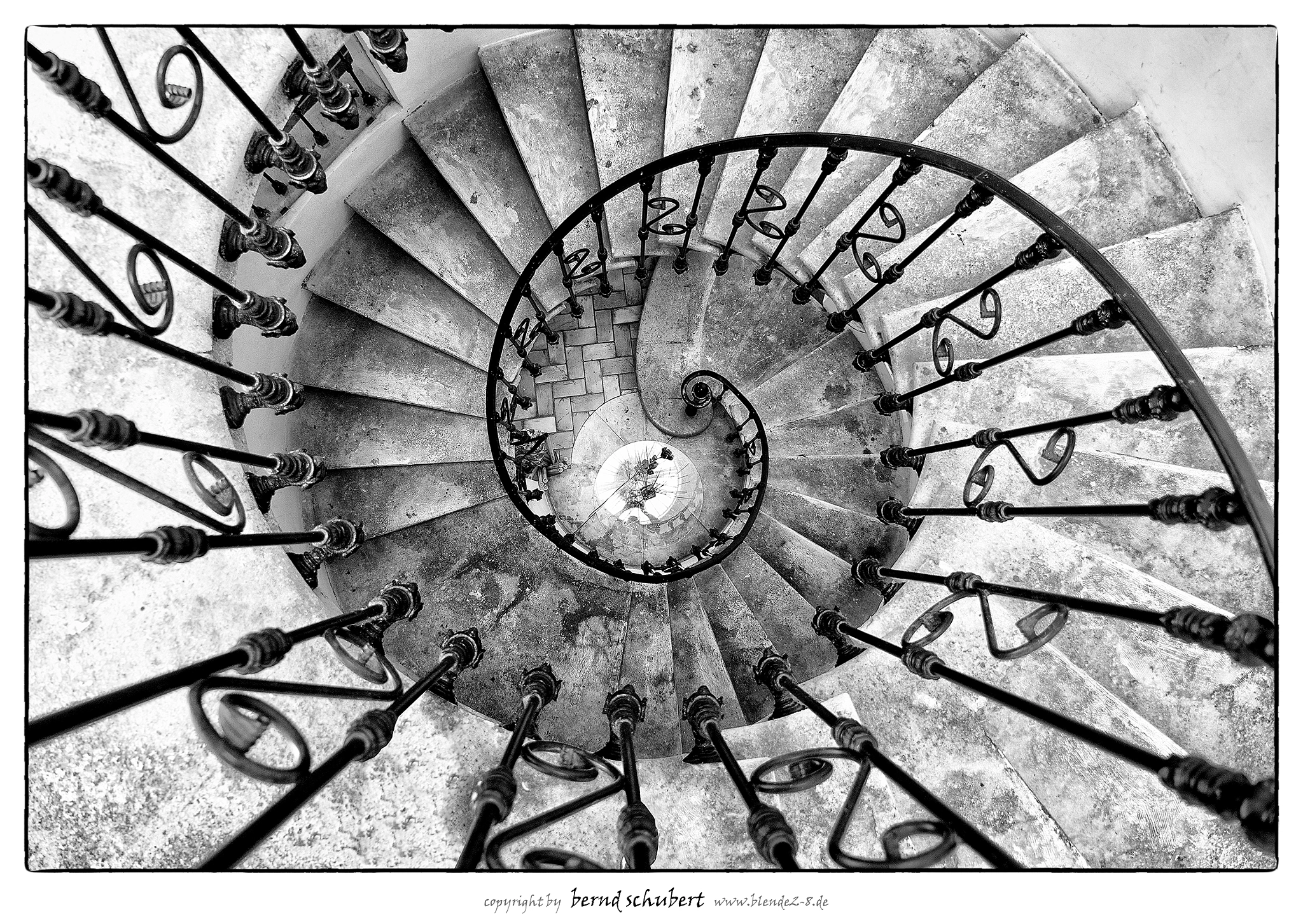 Panasonic Lumix G X Vario 12-35mm F2.8 ASPH Power OIS sample photo. Spiral staircase photography