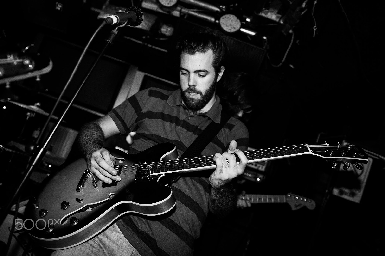 Sigma 18-35mm f/1.8 DC HSM sample photo. Guitarist stripe design photography