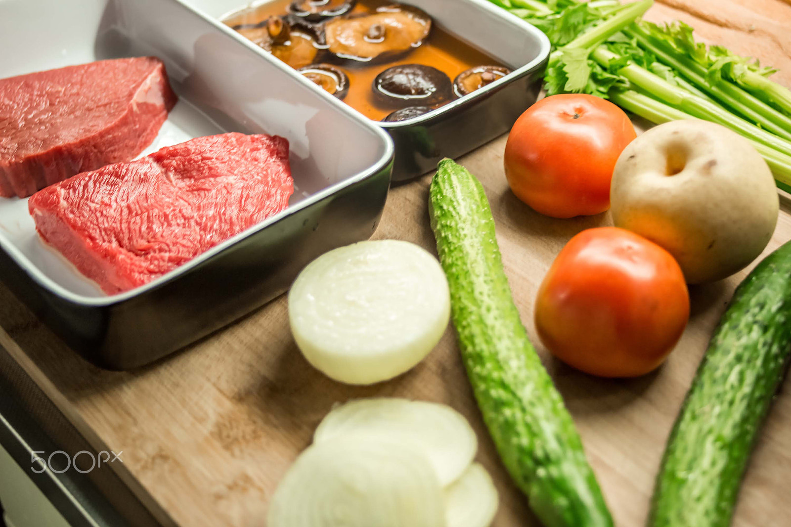 Canon EF 28-80mm f/2.8-4L sample photo. Ingredients on old chopping board photography