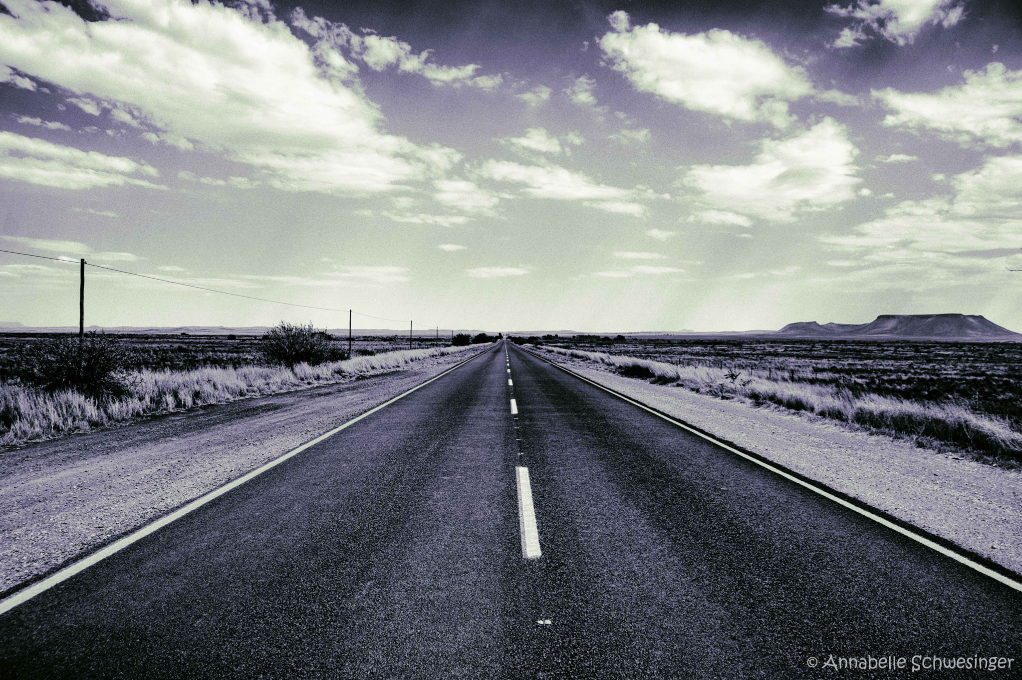 Sigma 18-250mm F3.5-6.3 DC Macro OS HSM sample photo. Leading road to nowhere photography