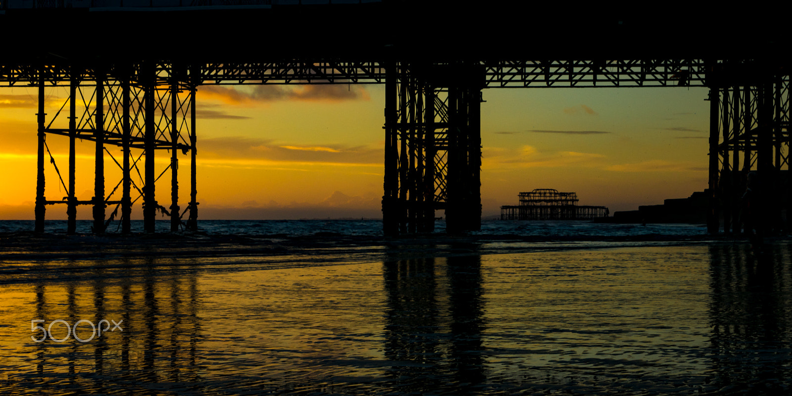 Sony a7R + Sony E 18-200mm F3.5-6.3 OSS sample photo. Through the pier photography