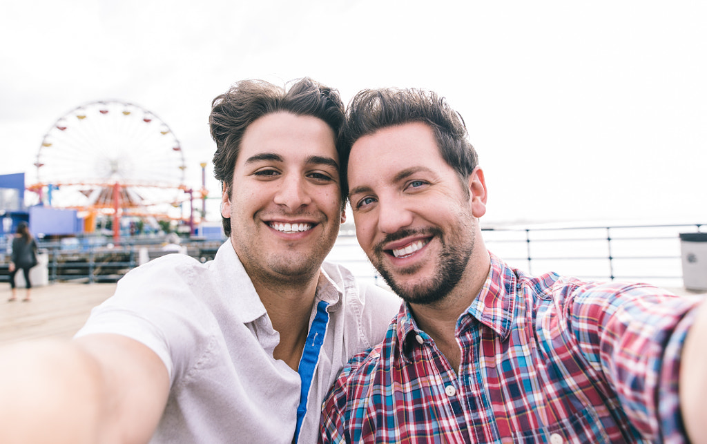 happy couple in love in Santa monica on the pier by Cristian Negroni on 500px.com