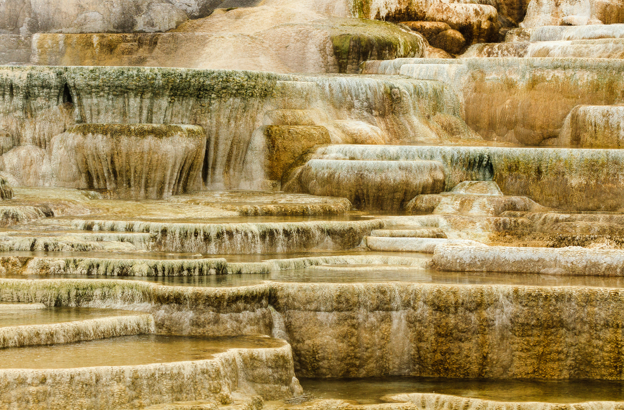 Canon EOS 7D + Canon EF 70-300mm F4.5-5.6 DO IS USM sample photo. Geyser terrace patterns at mammoth hot springs photography