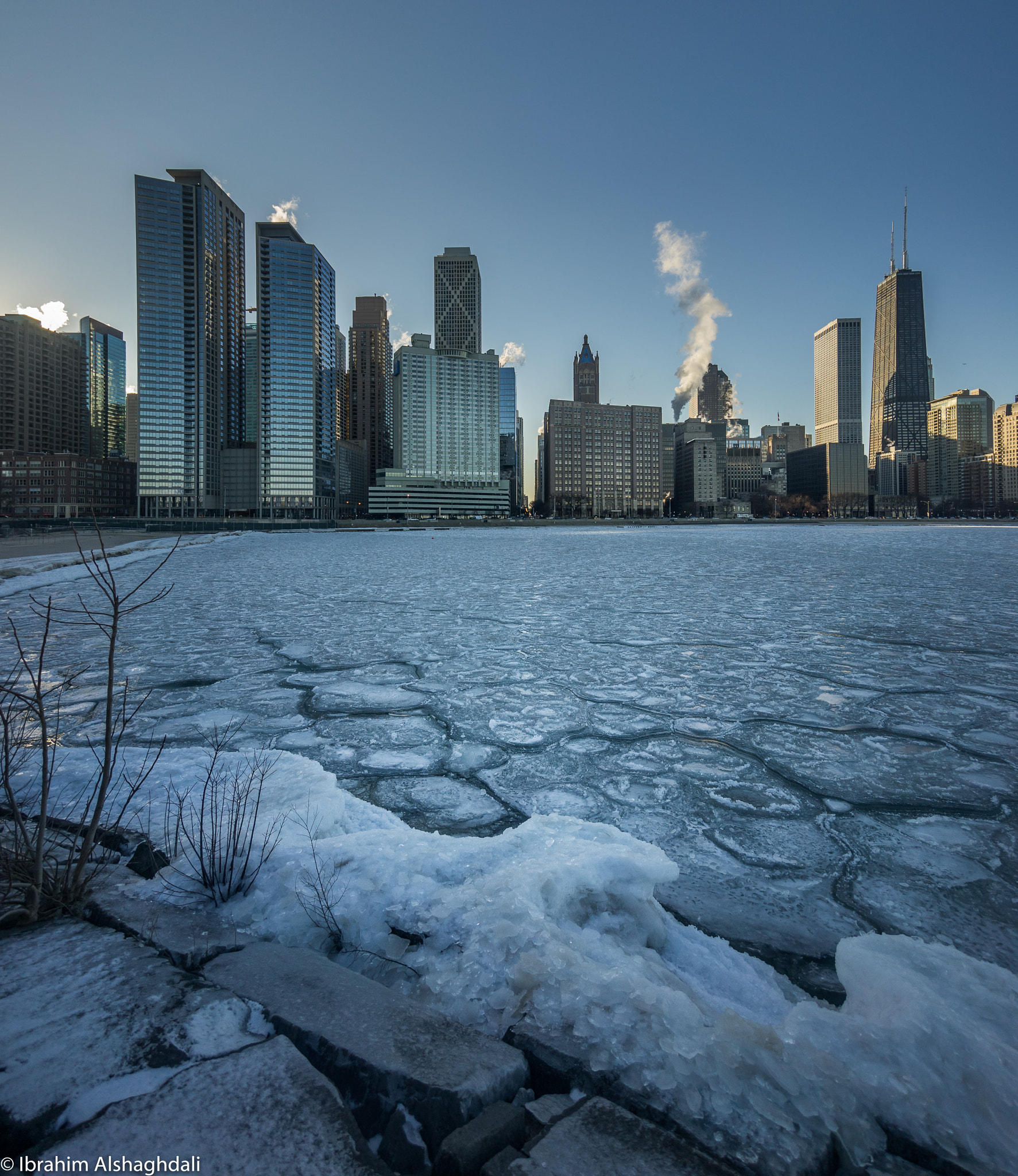 Sony a7 + Sony E 10-18mm F4 OSS sample photo. Michigan lake beautifully frozen photography