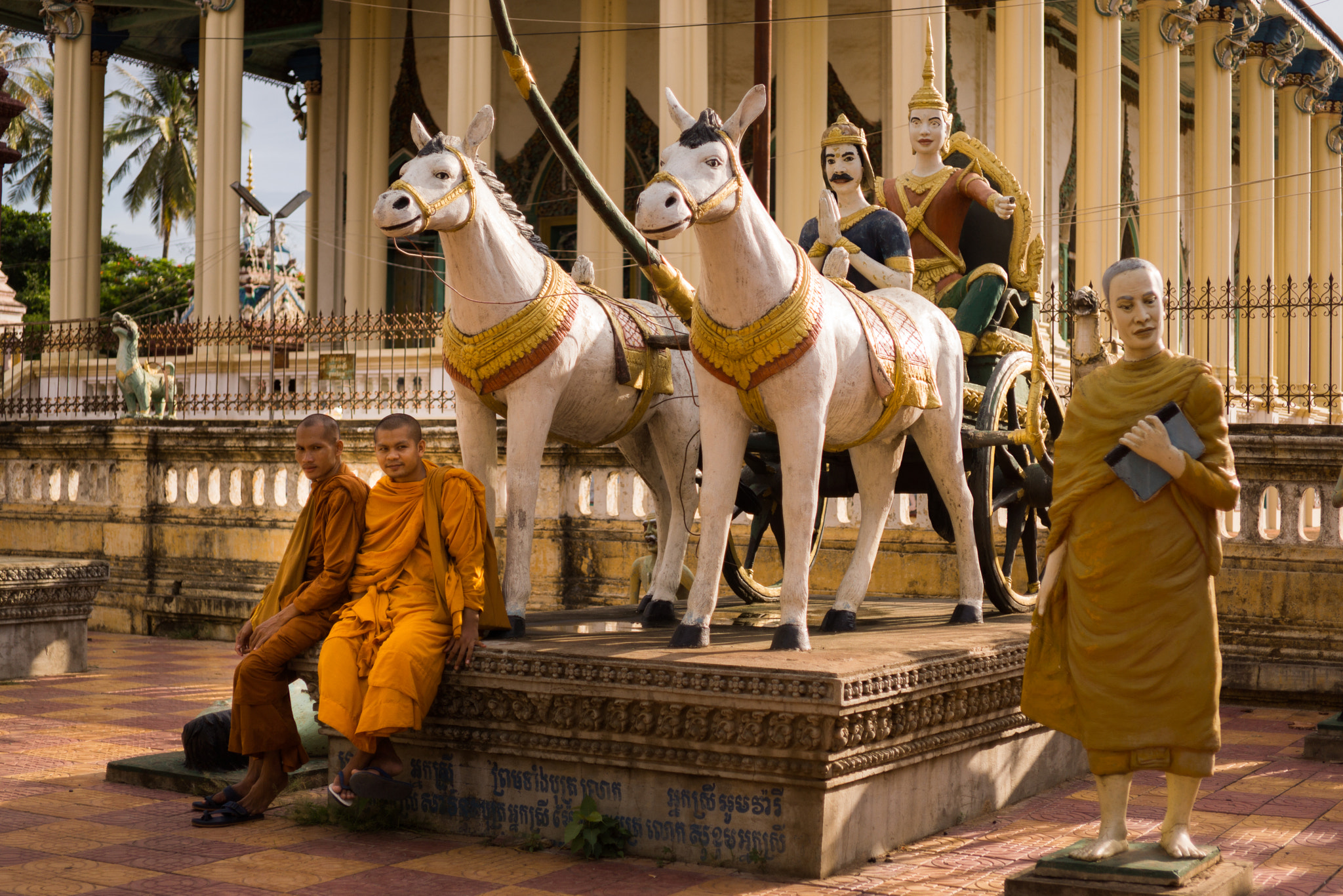 E 32mm F1.8 sample photo. Scultures and monks photography