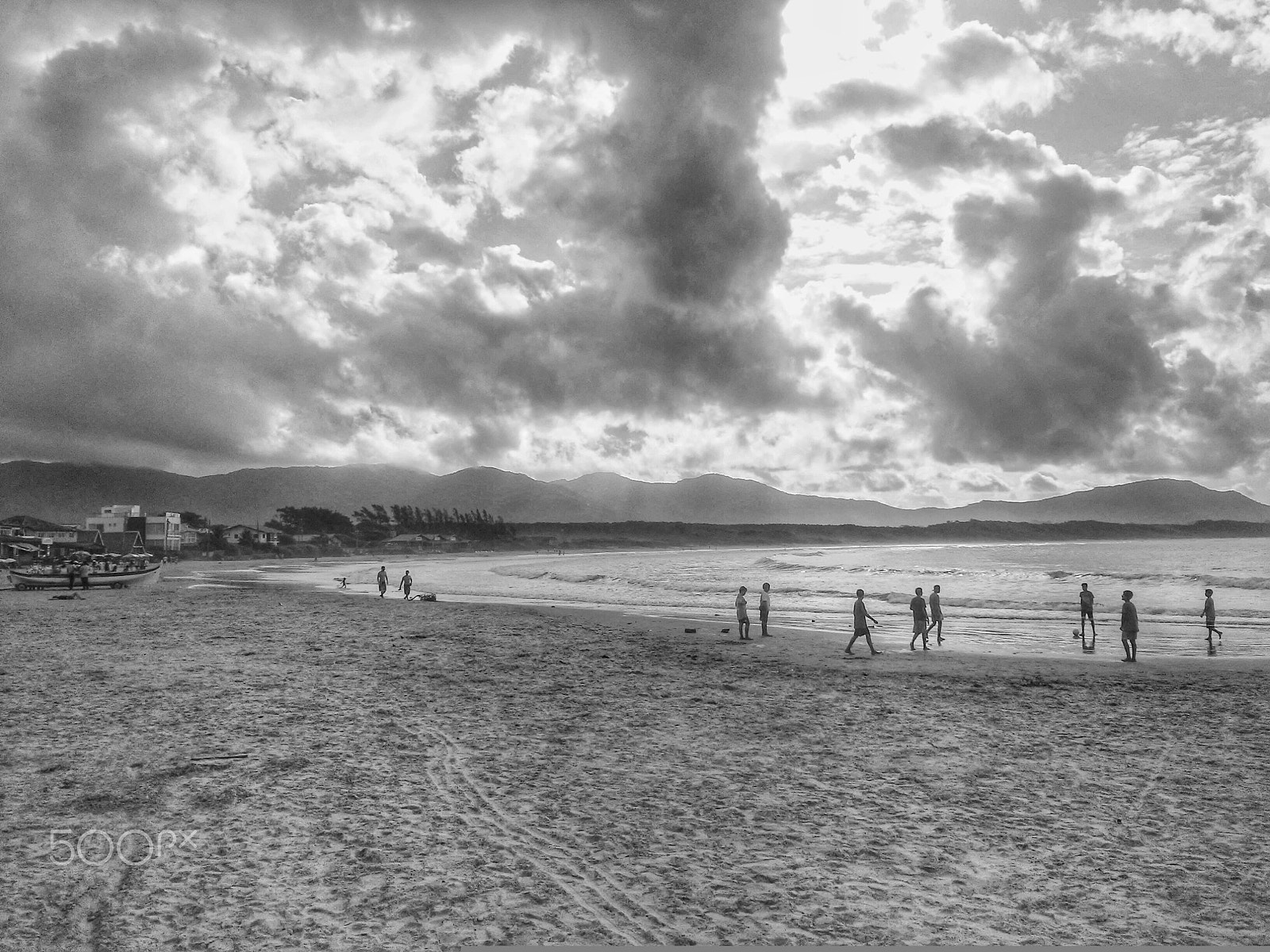 LG L Fino sample photo. Boys playing soccer on the beach photography