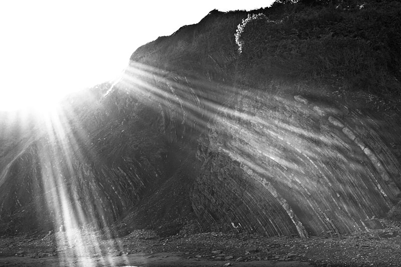 Olympus PEN E-P2 + Olympus M.Zuiko Digital 25mm F1.8 sample photo. Beams, flare and geological faults photography