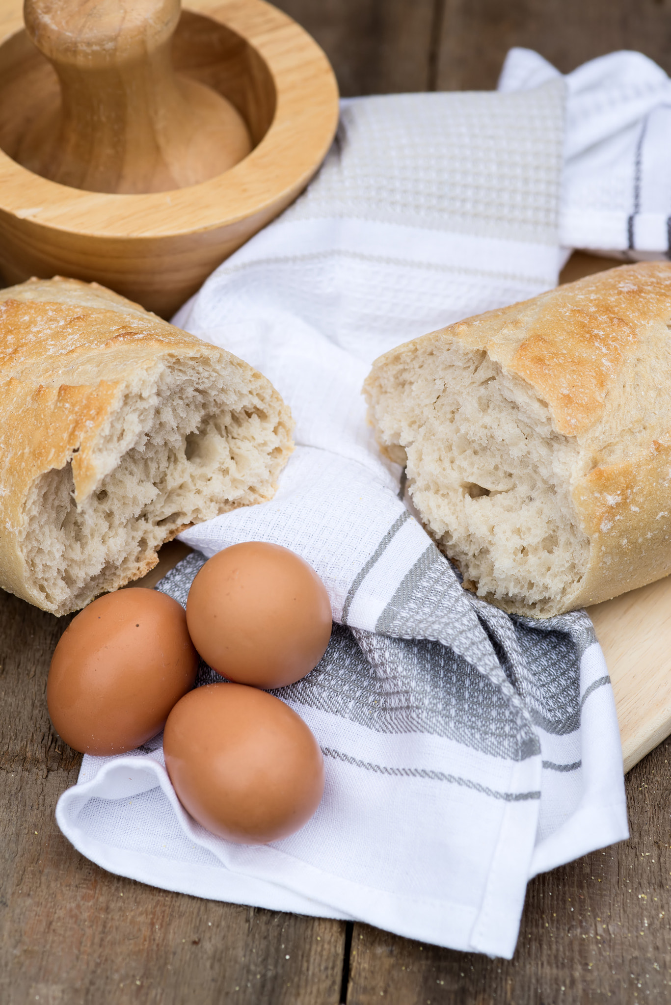 Nikon D600 + Sigma 105mm F2.8 EX DG Macro sample photo. Loaf of sourdough bread in rustic kitchend setting photography