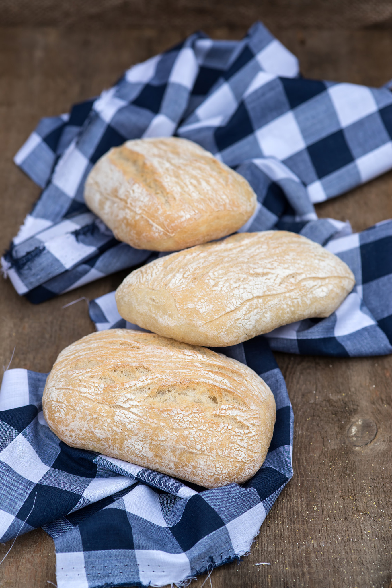 Nikon D600 + Sigma 105mm F2.8 EX DG Macro sample photo. Panini rolls in rustic kitchen setting with cooking utensils photography