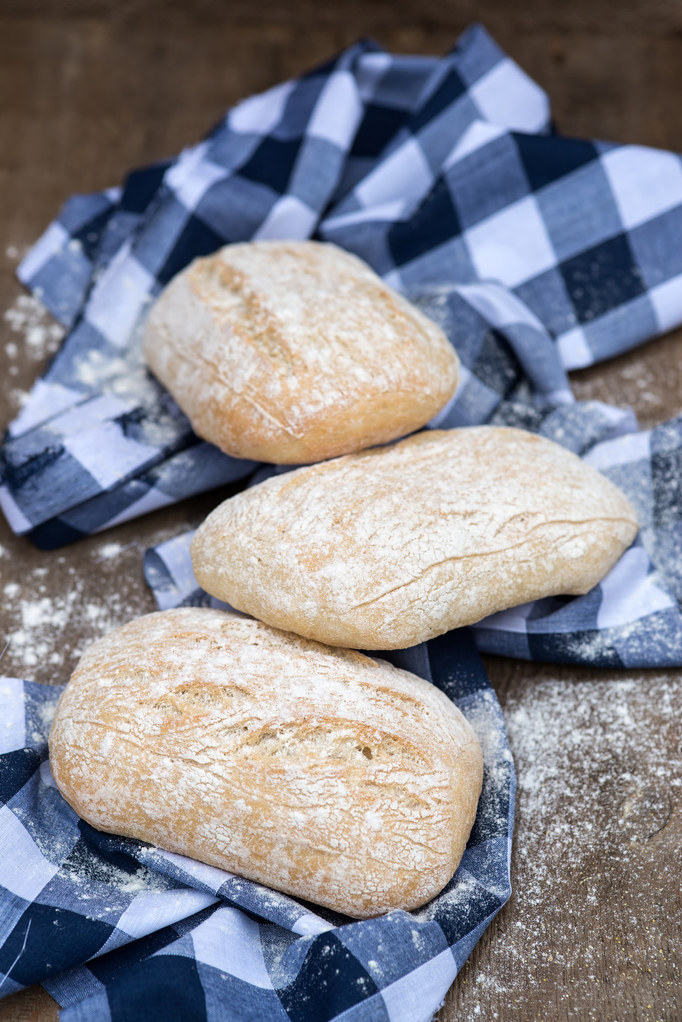 Nikon D600 + Sigma 105mm F2.8 EX DG Macro sample photo. Panini rolls in rustic kitchen setting with cooking utensils photography