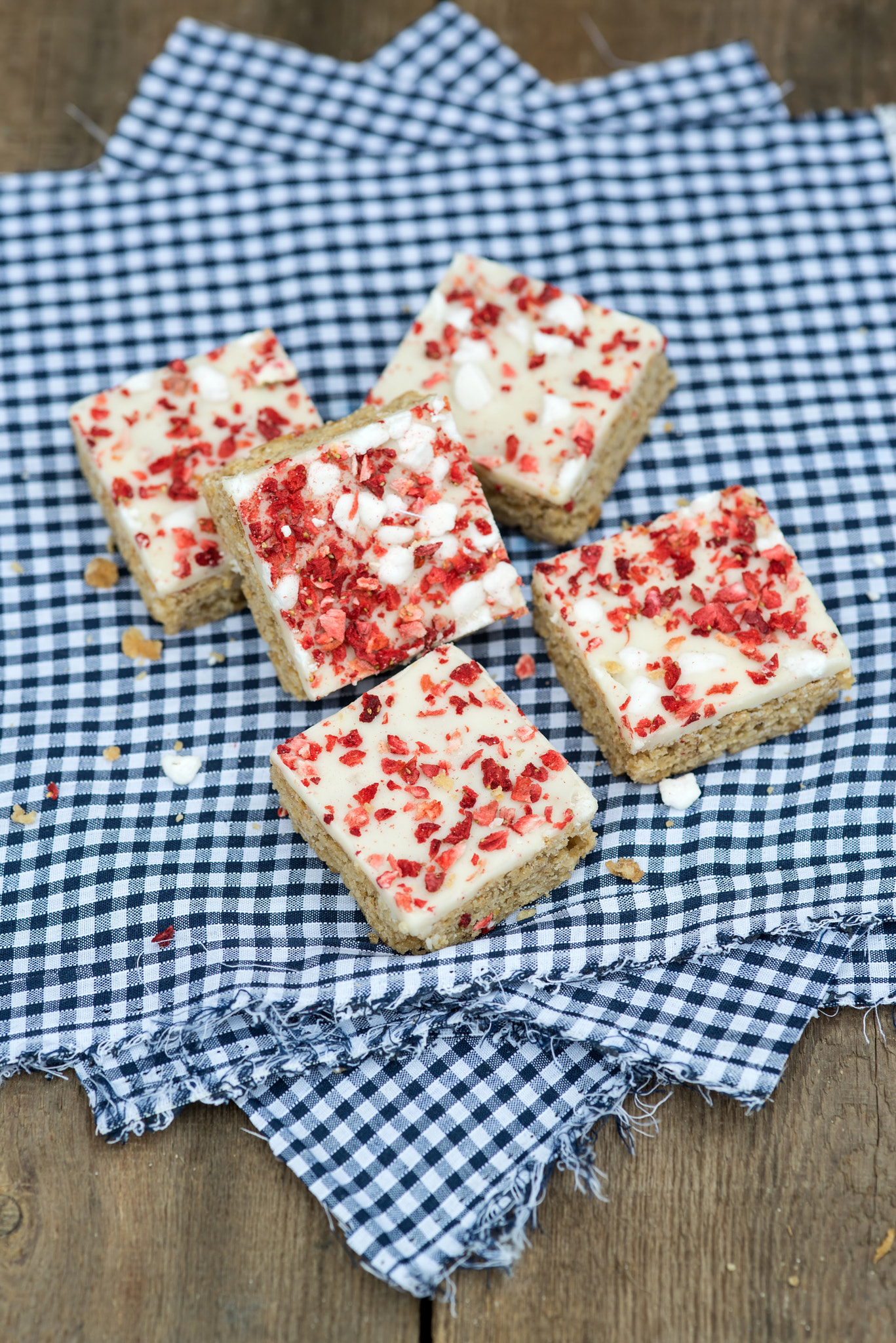 Nikon D600 + Sigma 105mm F2.8 EX DG Macro sample photo. Strawberry and meringue topped flapjack on gingham cloth photography