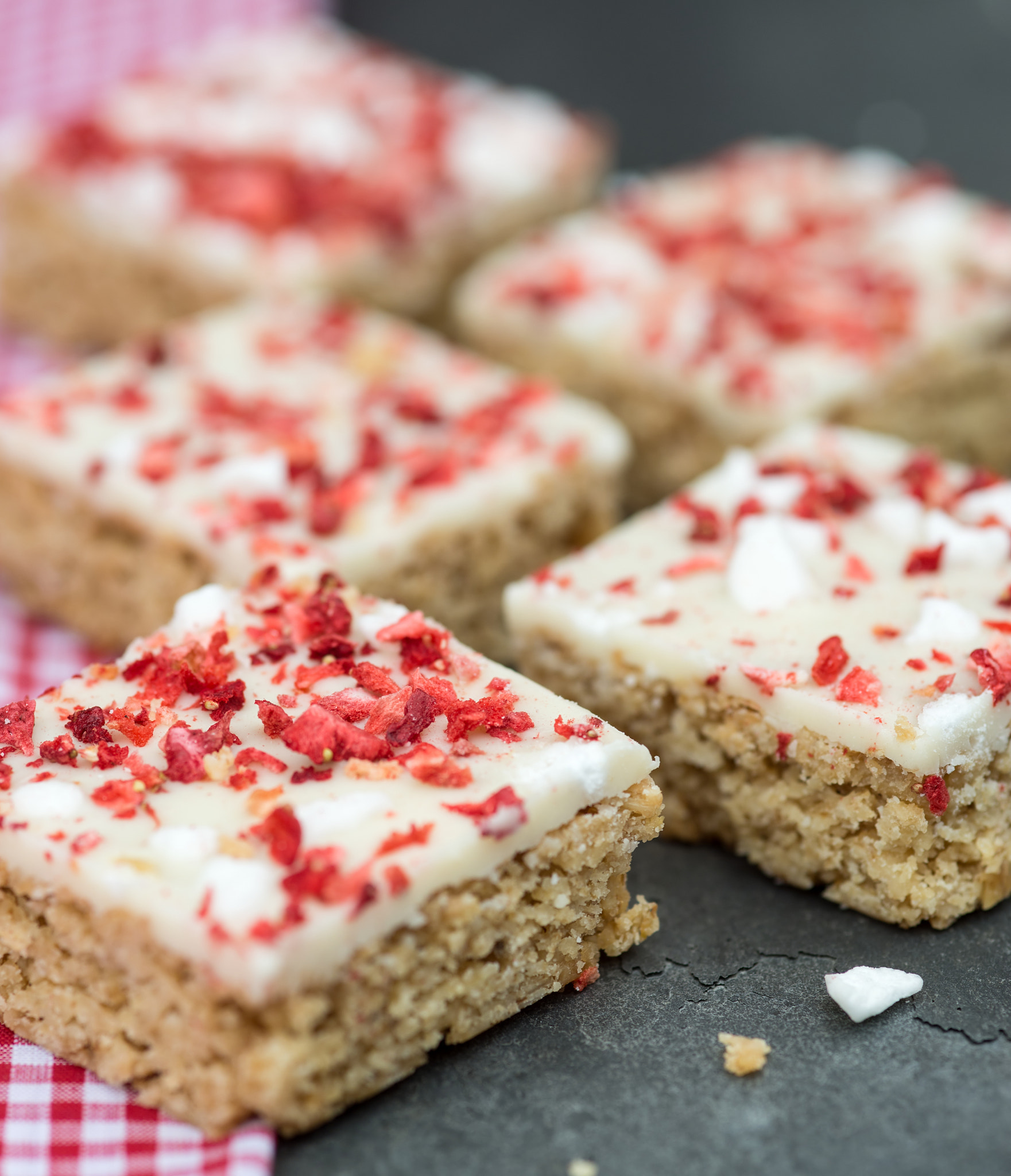 Nikon D600 + Sigma 105mm F2.8 EX DG Macro sample photo. Strawberry and meringue topped flapjack on gingham cloth photography
