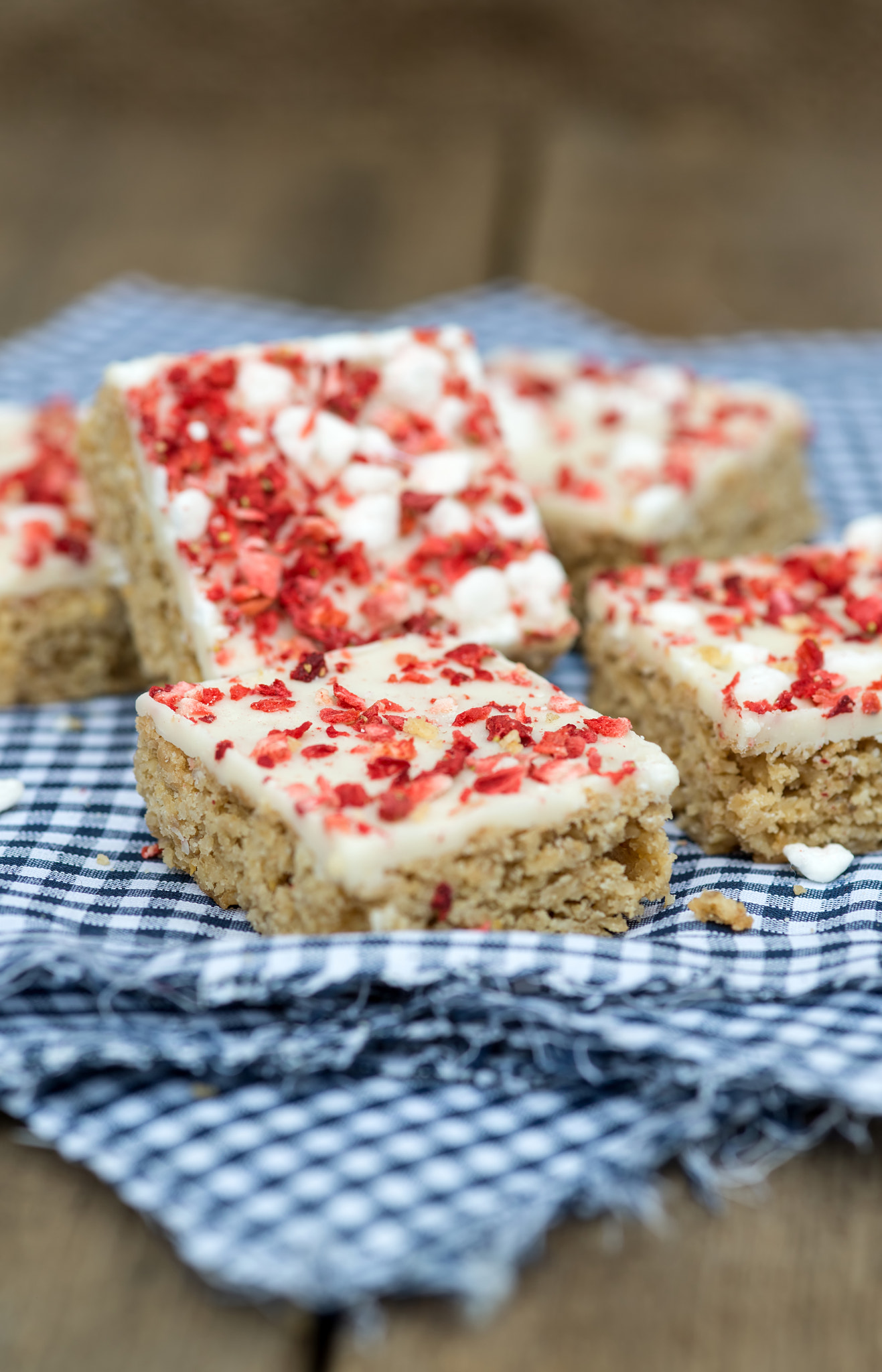 Nikon D600 + Sigma 105mm F2.8 EX DG Macro sample photo. Strawberry and meringue topped flapjack on gingham cloth photography