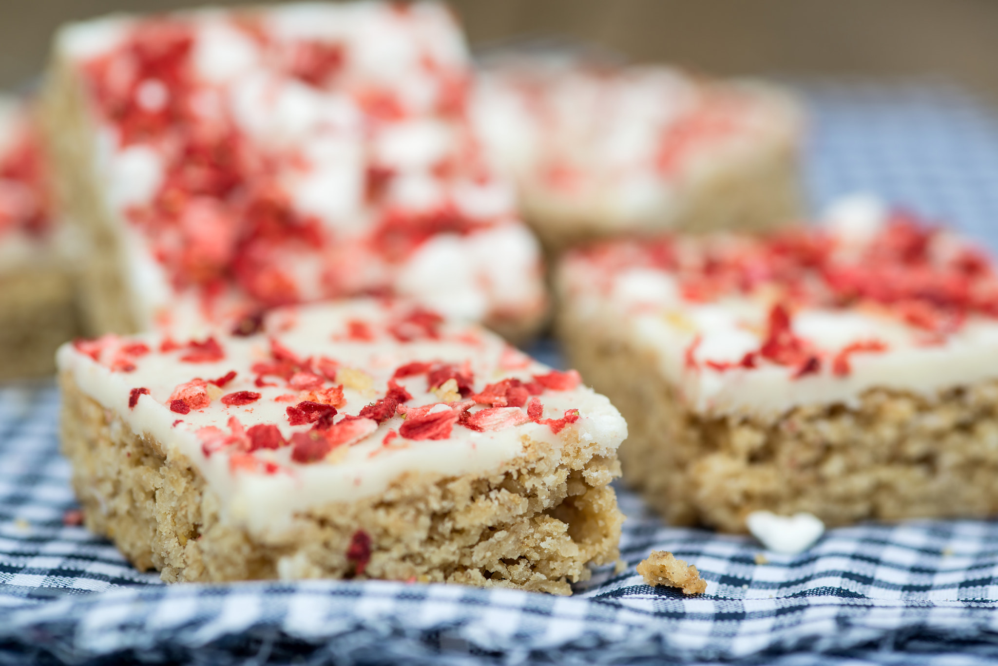 Nikon D600 + Sigma 105mm F2.8 EX DG Macro sample photo. Strawberry and meringue topped flapjack on gingham cloth photography