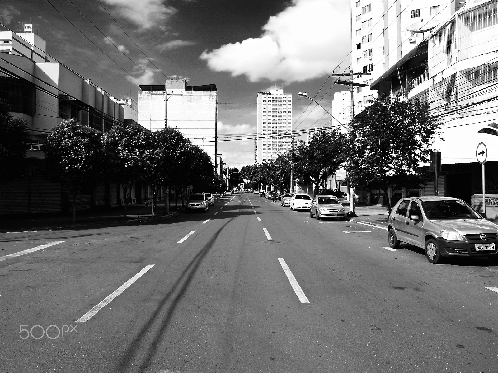 Olympus Zuiko Digital ED 14-42mm F3.5-5.6 sample photo. Black an' white in the street. photography