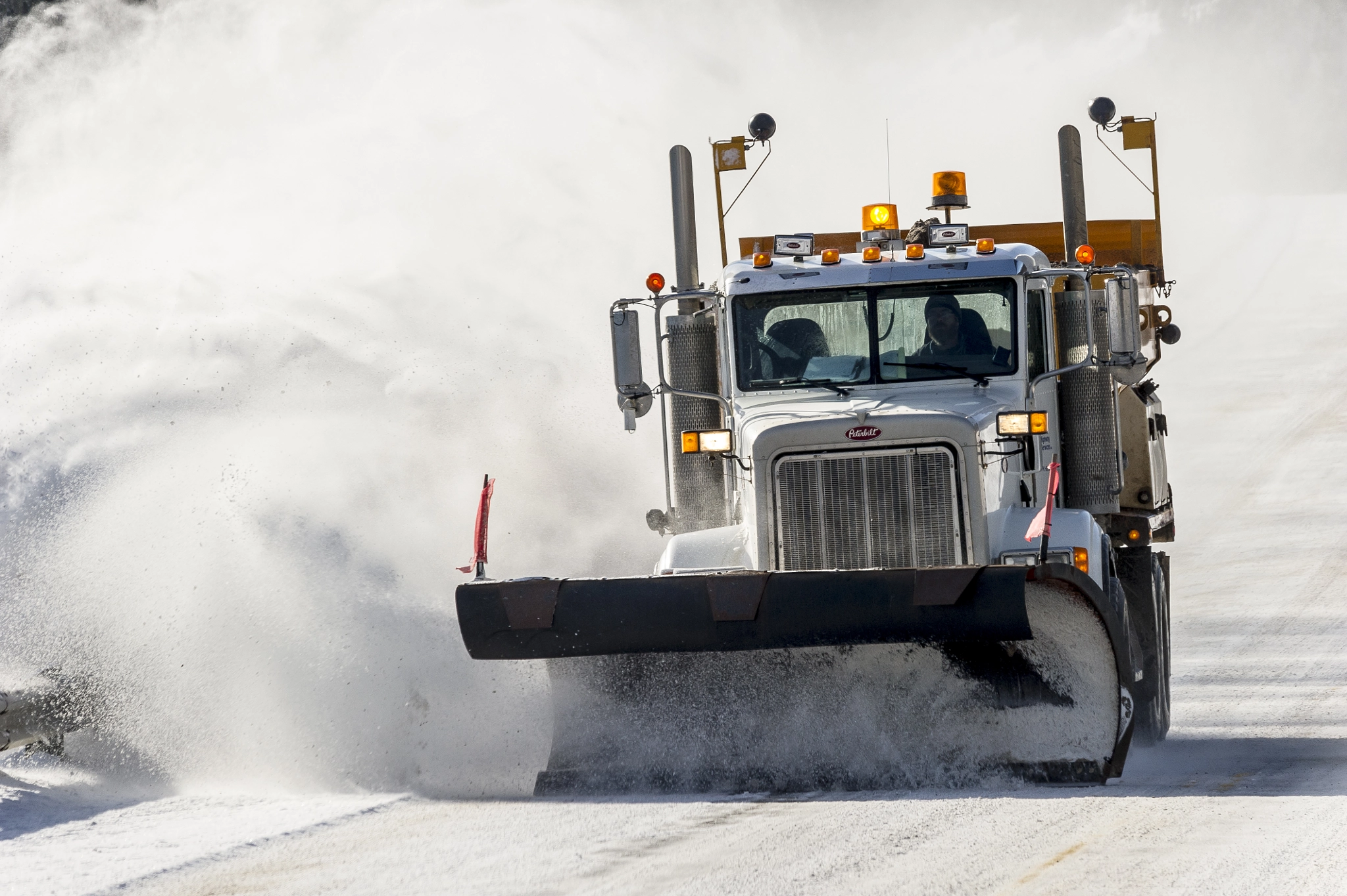 Sigma 150-500mm F5-6.3 DG OS HSM sample photo. Highway snow plow truck in action by abraham lake alberta photography