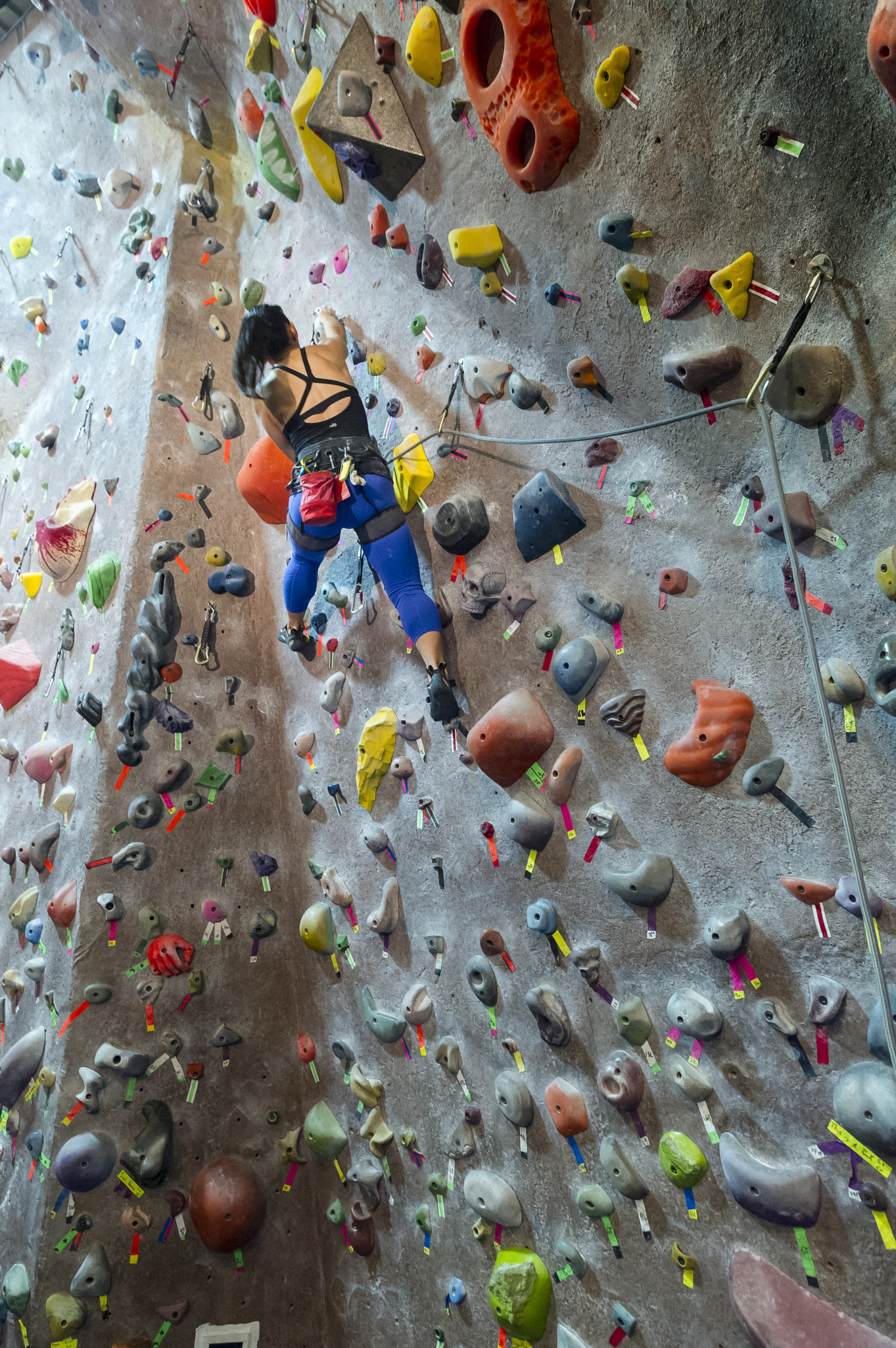 Nikon D3S + Sigma 20mm F1.8 EX DG Aspherical RF sample photo. Expert woman climber at vertically inclined climbing wall edmonton alberta photography