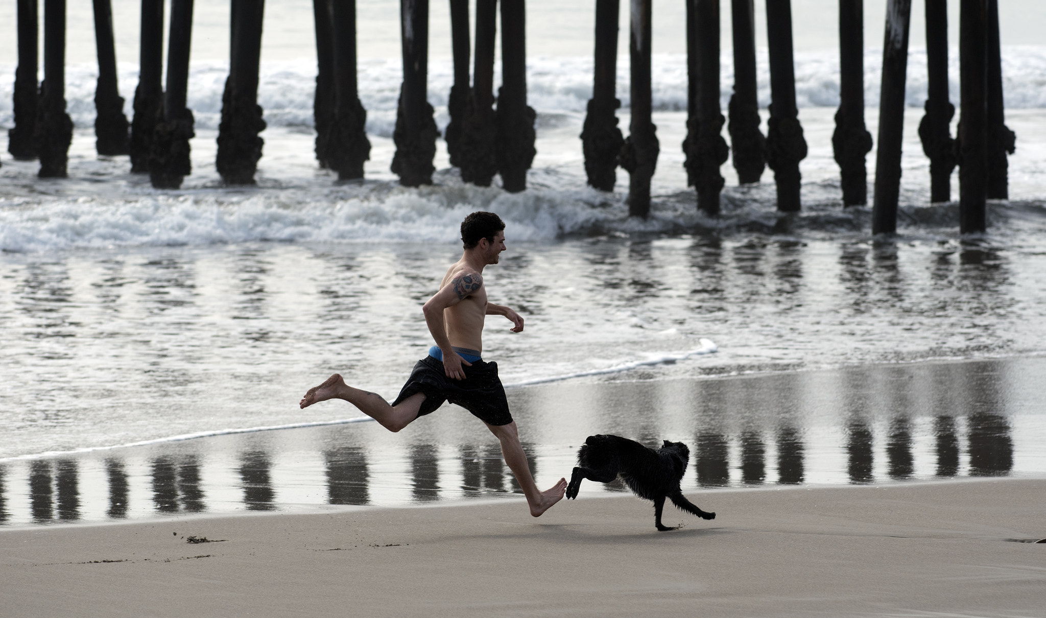 Nikon AF-S Nikkor 70-200mm F4G ED VR sample photo. Beach sprint photography