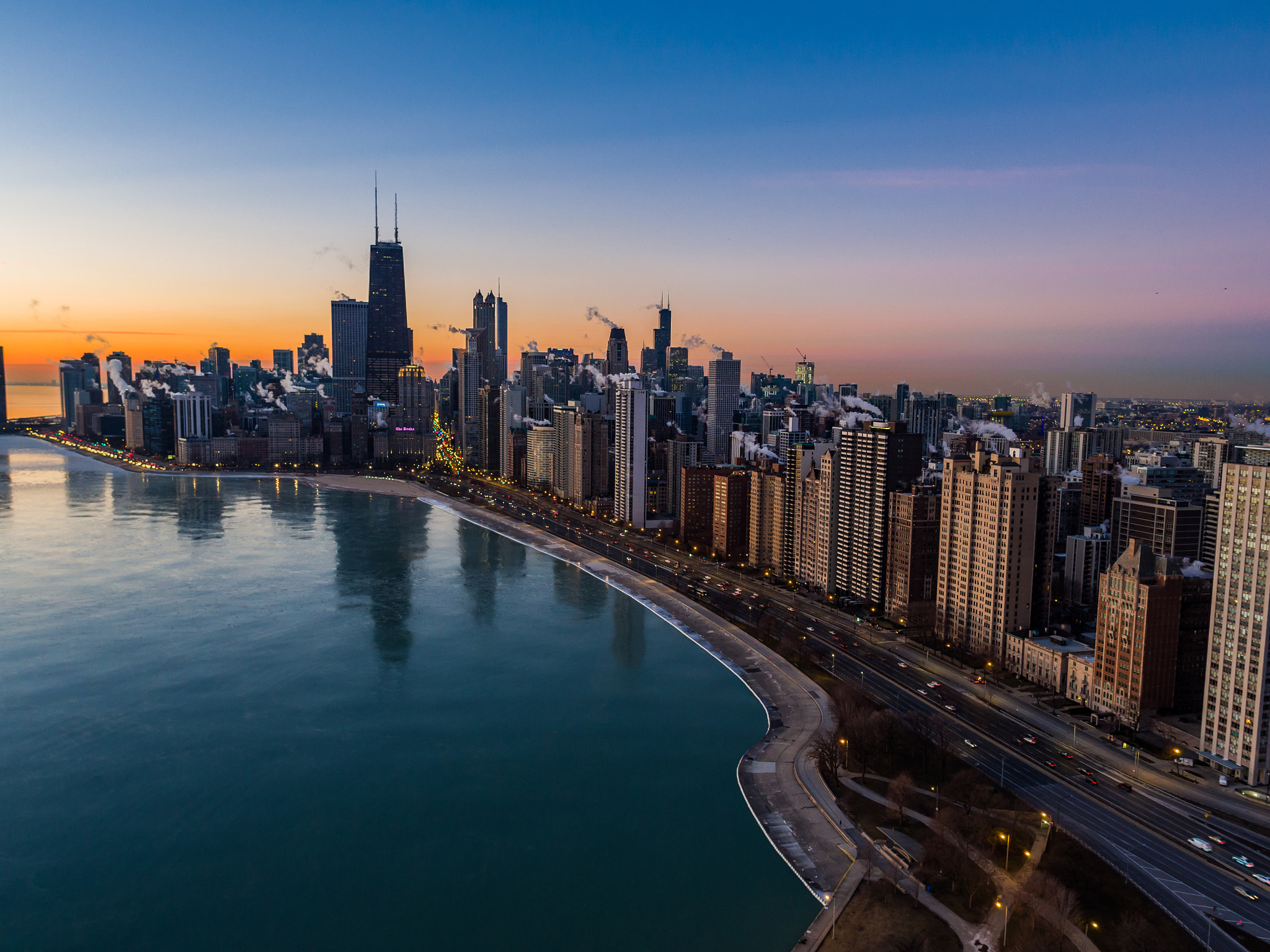 DJI FC550 + OLYMPUS M.12mm F2.0 sample photo. Chicago sunrise aerial photo from north ave photography