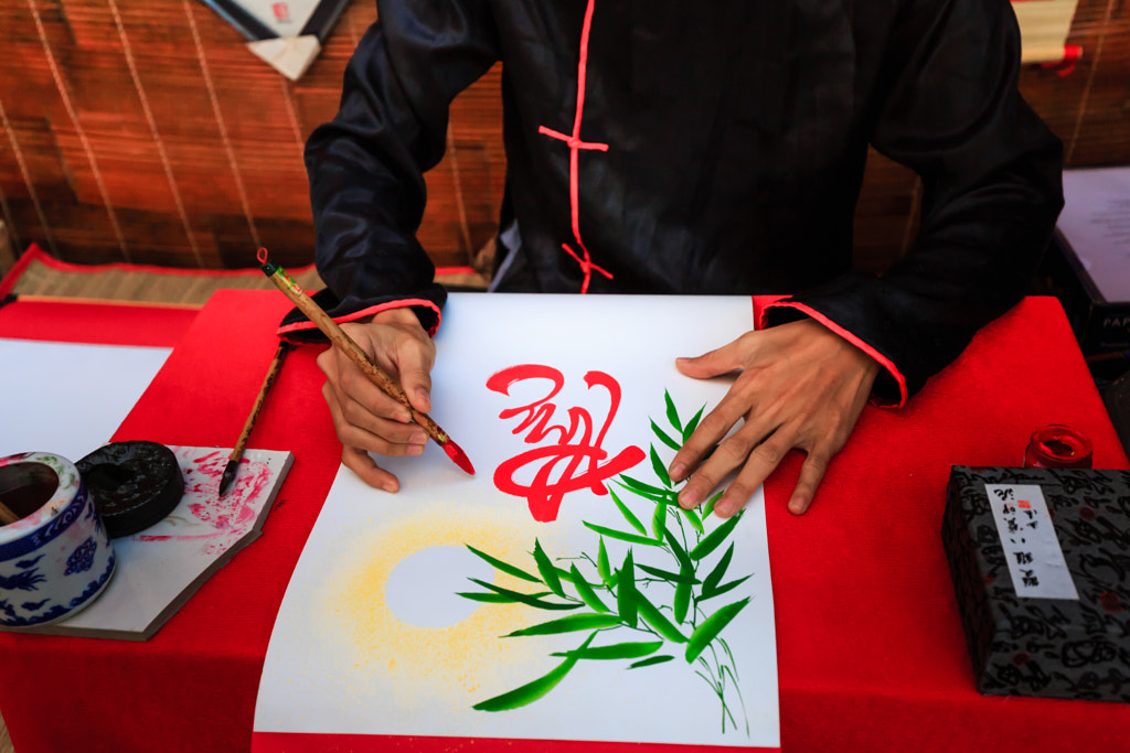 young Vietnamese scholar at lunar new year calli by Quang Nguyen Vinh on 500px.com