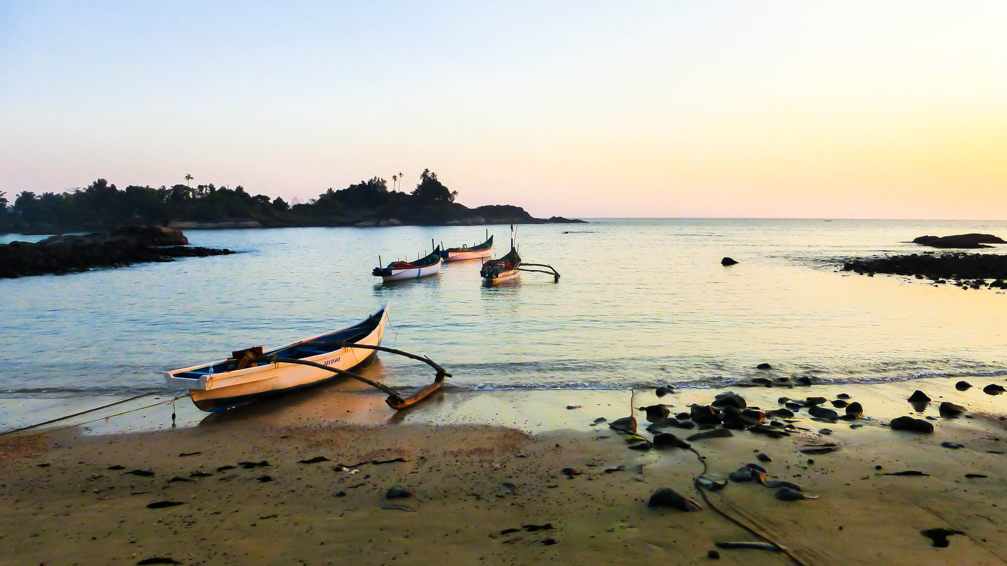 Panasonic DMC-TZ36 sample photo. Boats in the evening shore photography