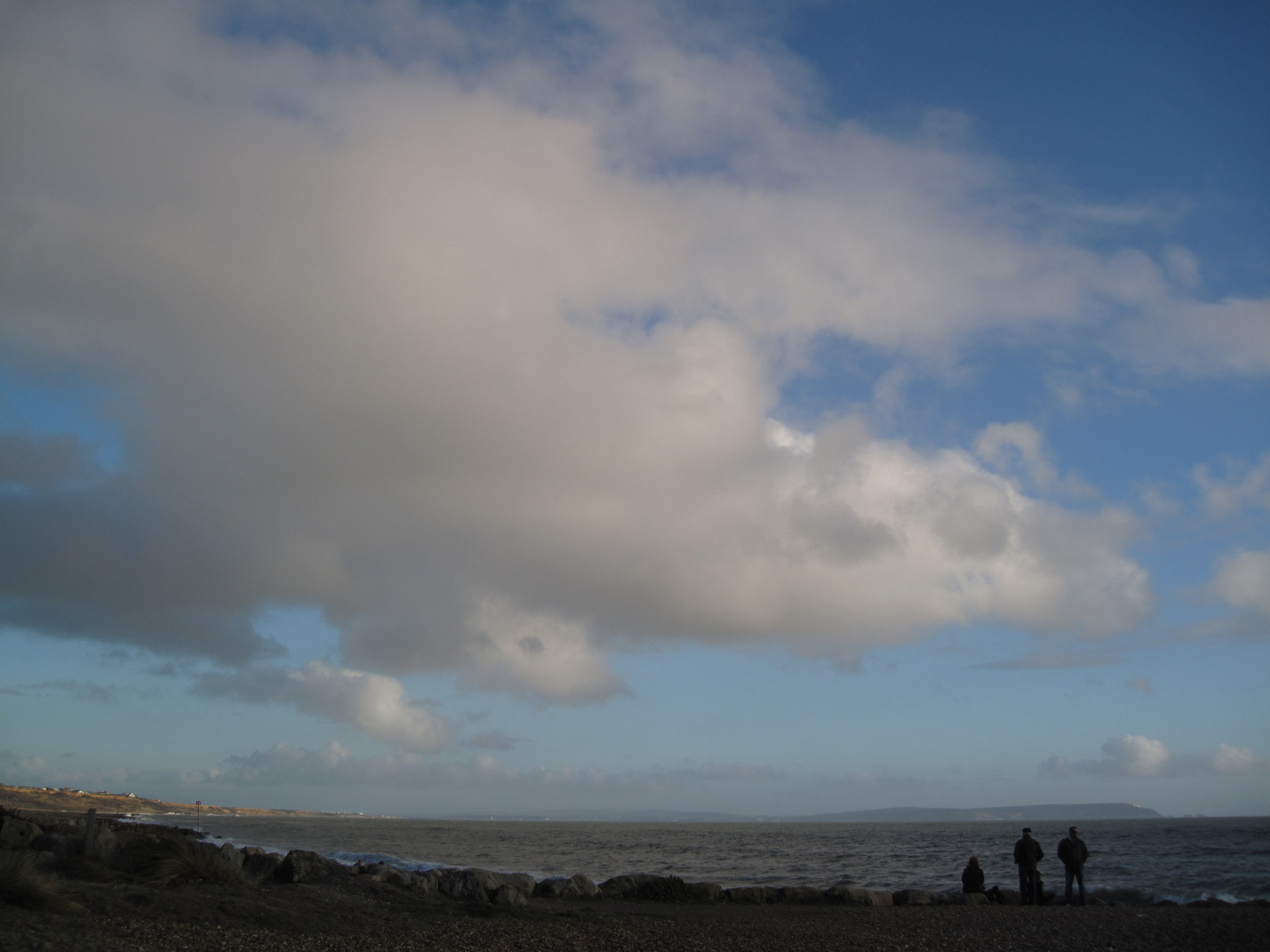 Canon PowerShot SD990 IS (Digital IXUS 980 IS / IXY Digital 3000 IS) sample photo. Clouds plus people photography