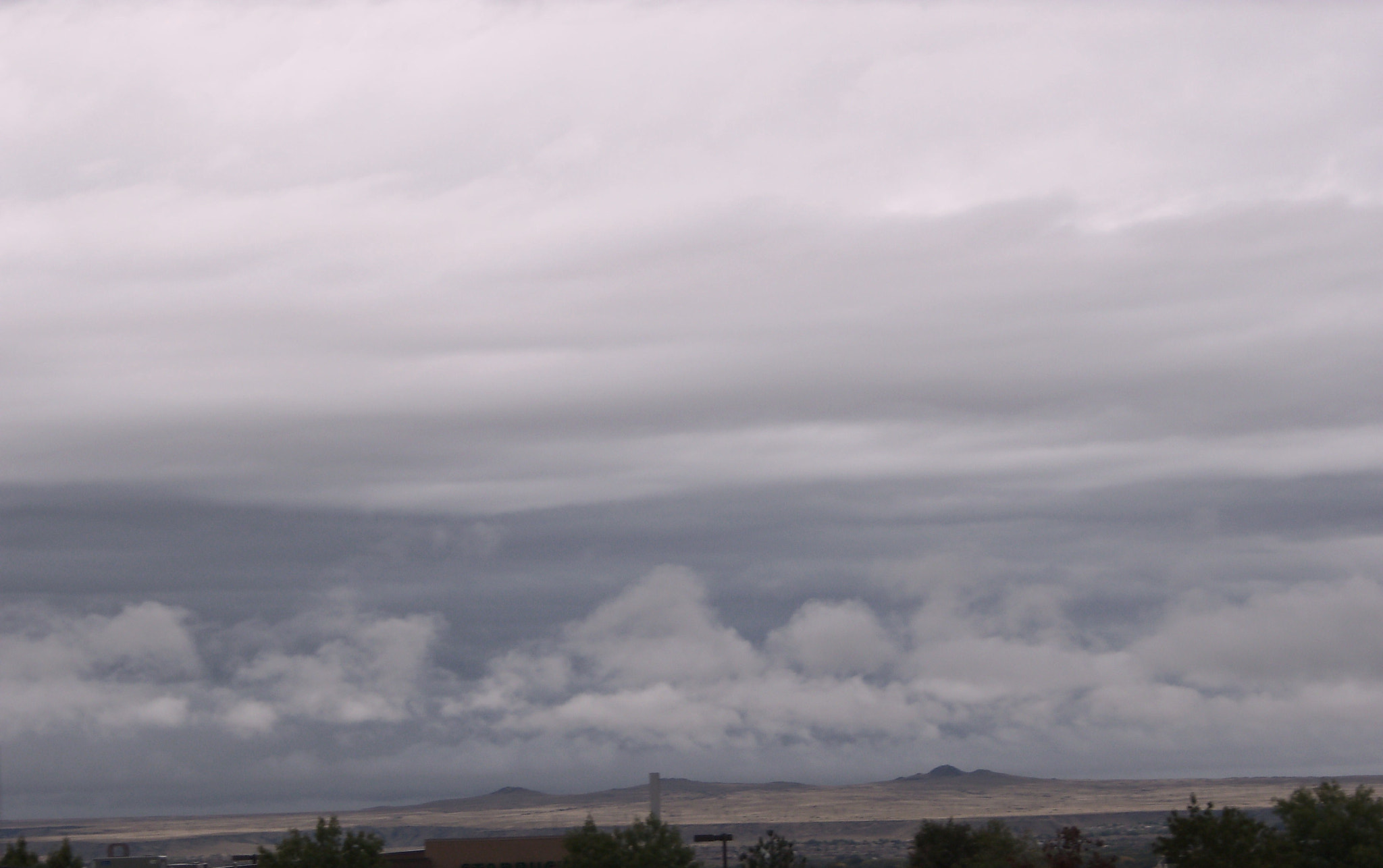 Kodak EASYSHARE C142 DIGITAL CAMERA sample photo. Cool breeze and rain in the air photography