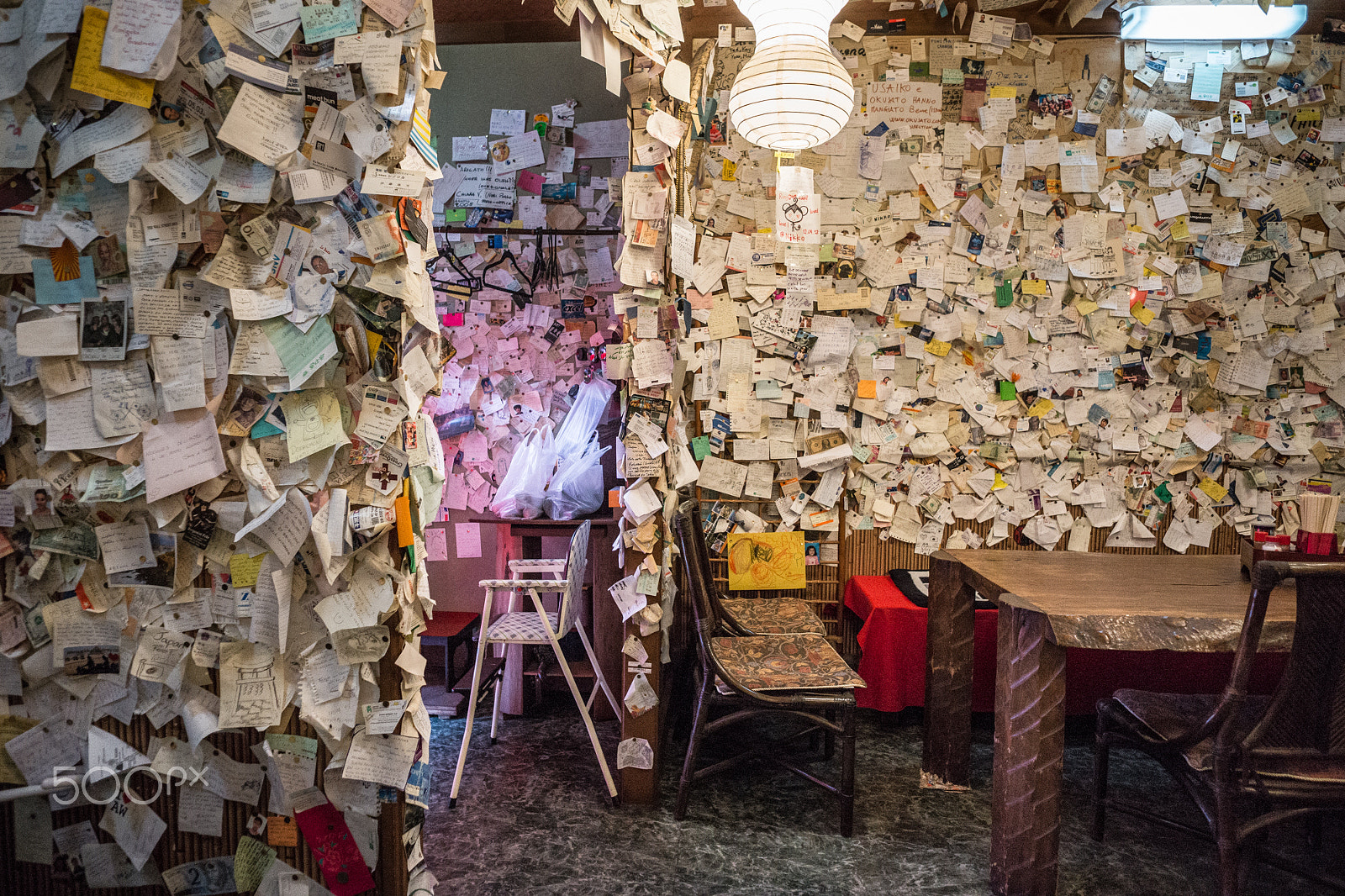 ZEISS Touit 12mm F2.8 sample photo. Messy restaurant photography