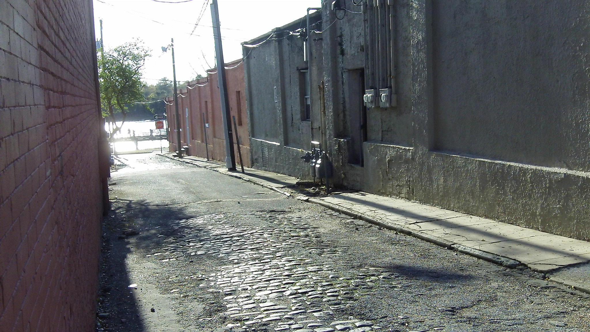 Kodak ZI8 POCKET VIDEO CAMERA sample photo. Cobblestone-alley-water-in-background.jpg photography