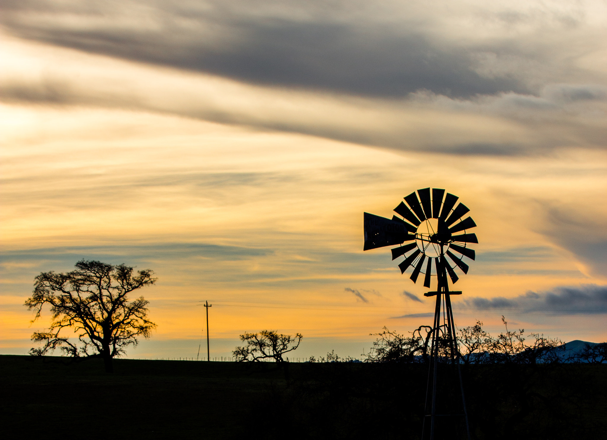 Canon EOS 100D (EOS Rebel SL1 / EOS Kiss X7) sample photo. Windmill at sunset photography