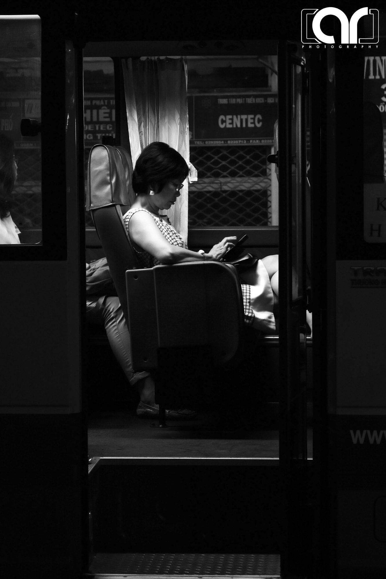 Nikon AF-S Nikkor 28-70mm F2.8 ED-IF sample photo. Lady in the bus photography