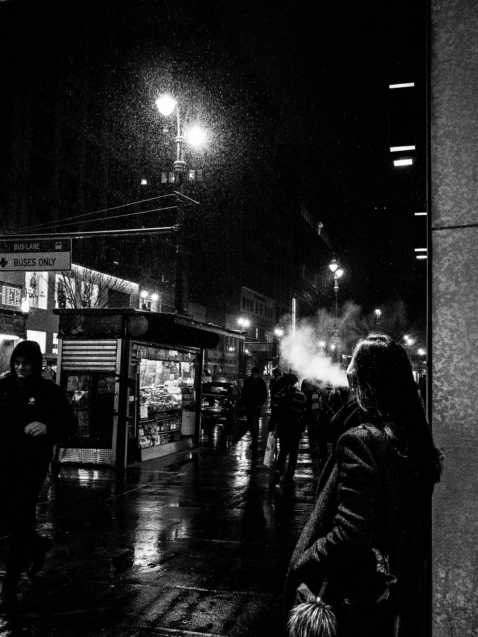 Olympus PEN E-PL6 + LUMIX G 20/F1.7 II sample photo. Smoking girl on a snowy night photography