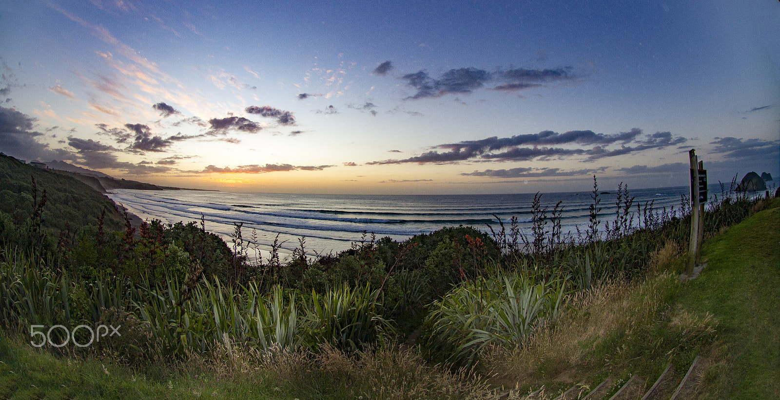 Canon EF 8-15mm F4L Fisheye USM sample photo. Back beach sunset surf photography