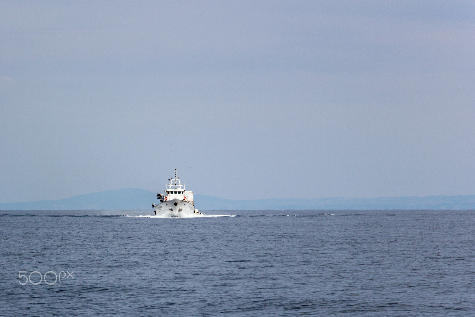 Canon EF-S 18-135mm F3.5-5.6 IS STM sample photo. Ship at sea photography