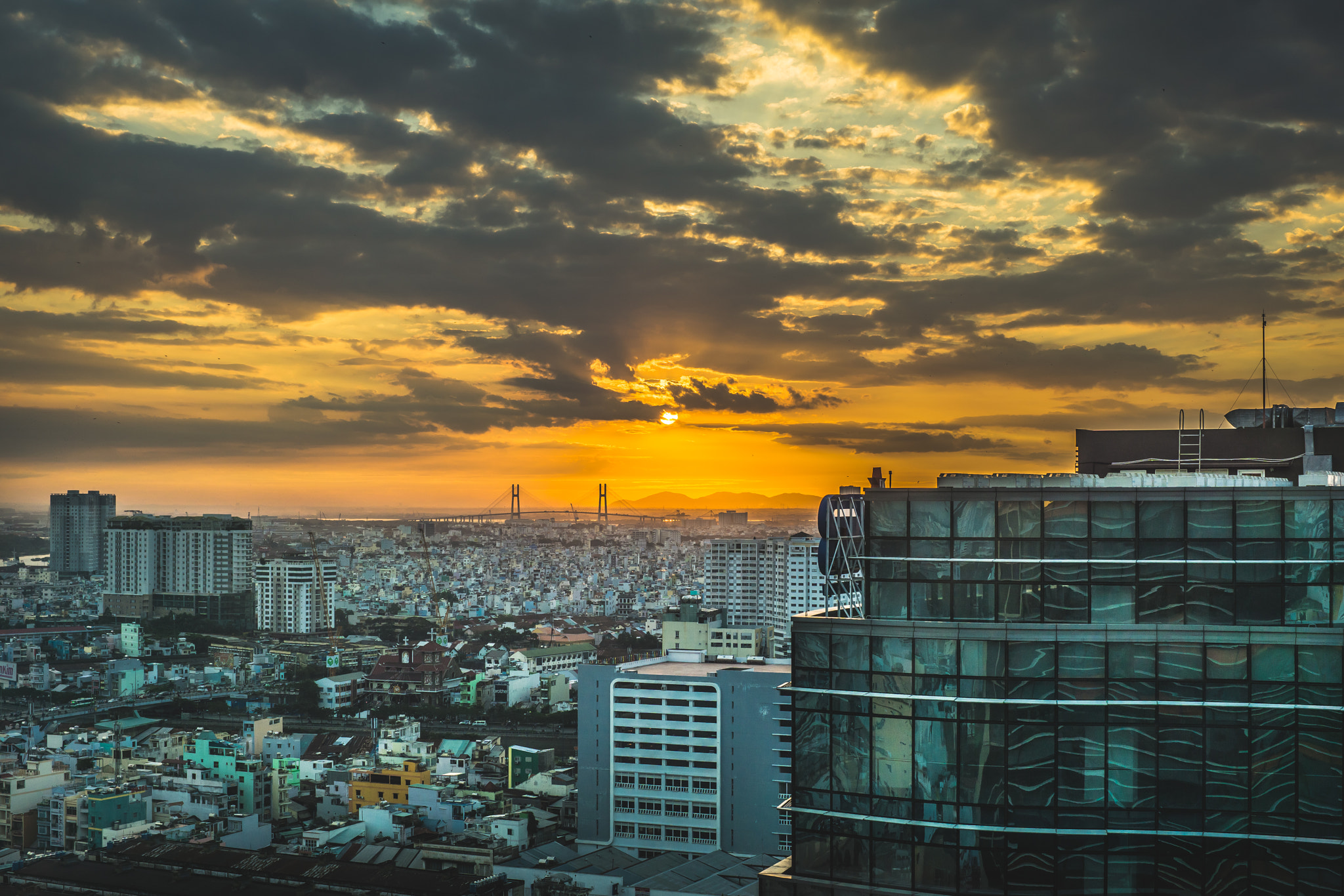 E 32mm F1.8 sample photo. Ho chi minh city sunrise photography