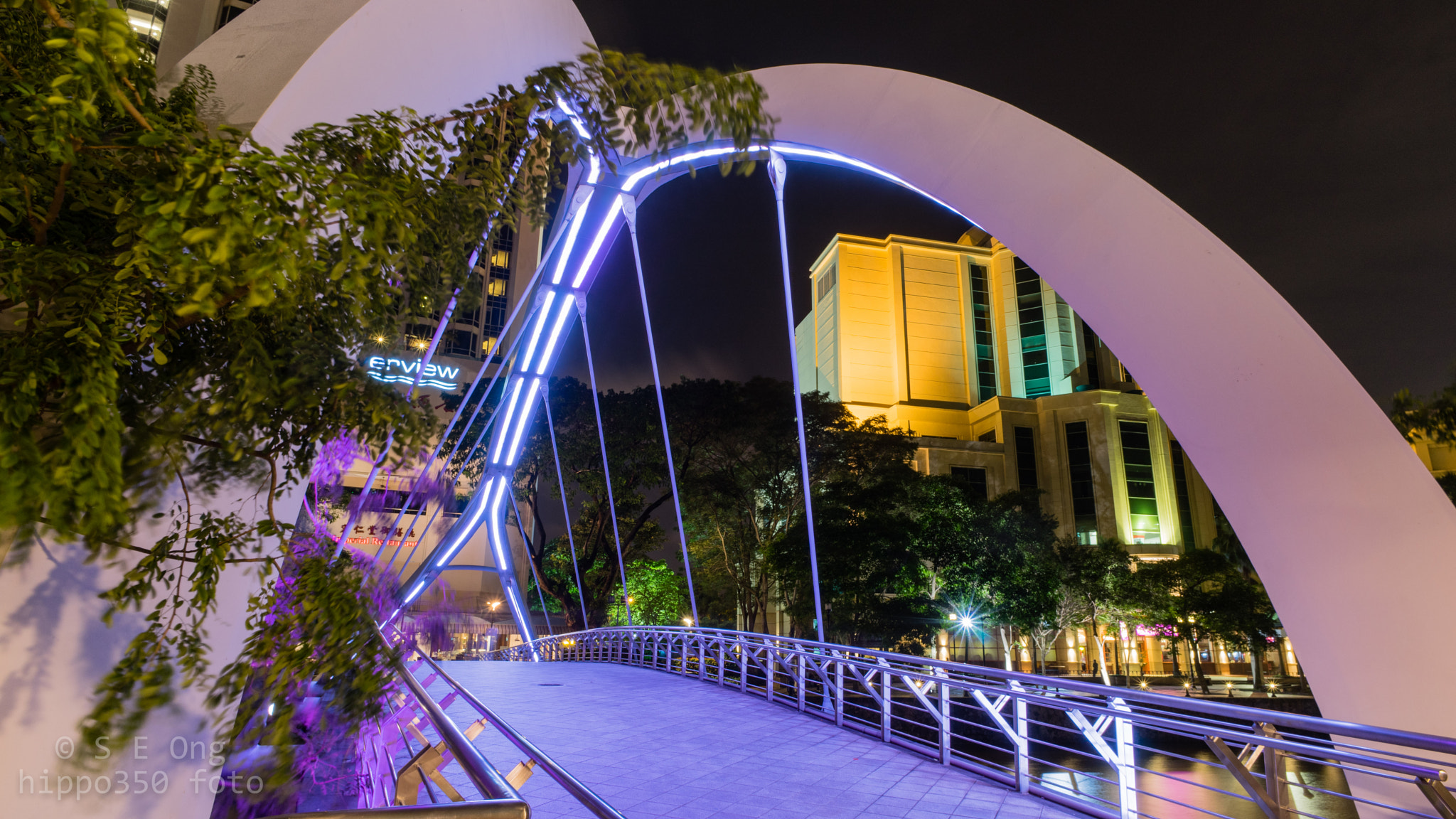 Sony a7 + Sony 20mm F2.8 sample photo. Pedestrian bridge at river view hotel photography