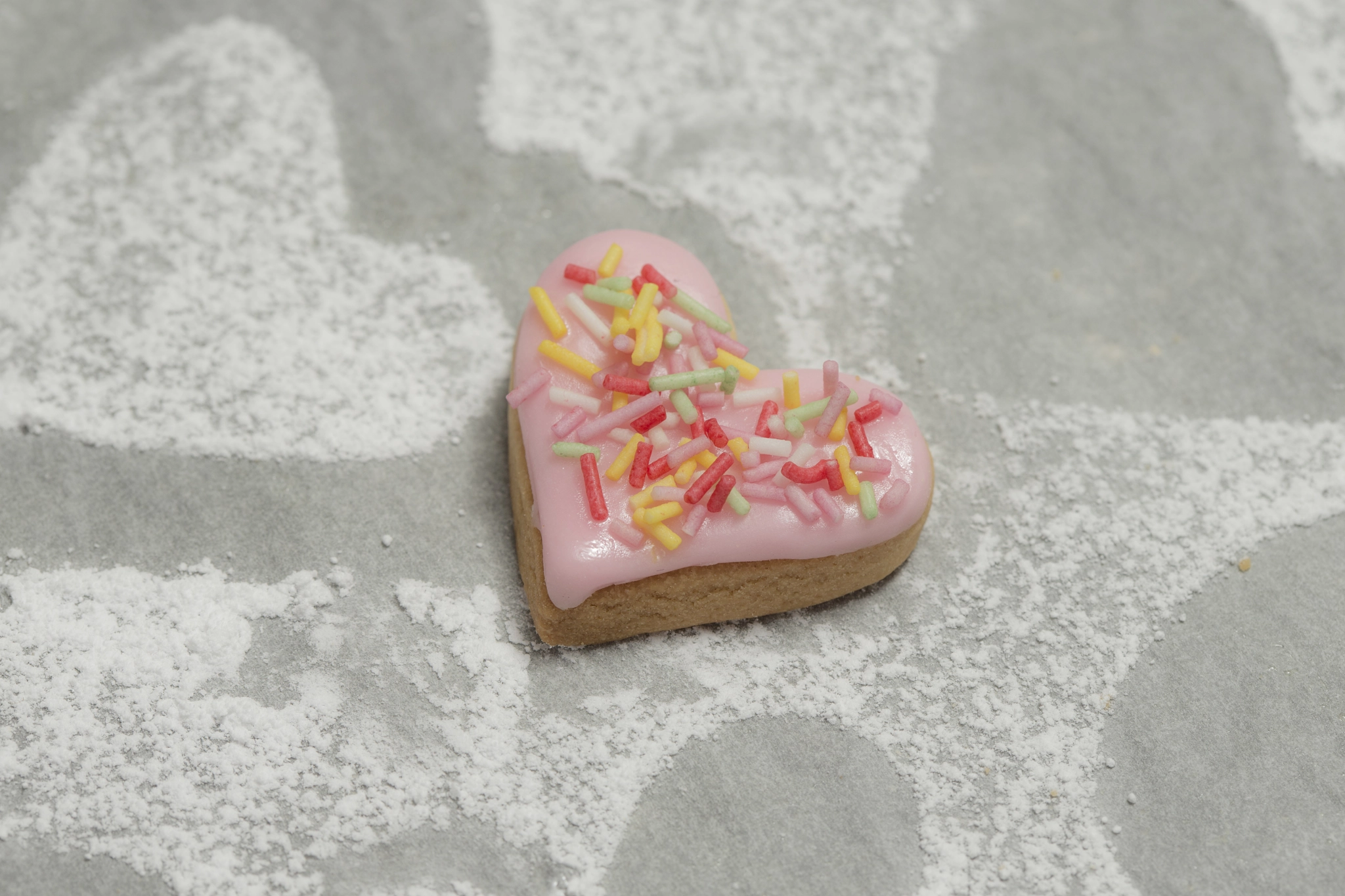 Canon EOS-1D X + Canon EF 100mm F2.8 Macro USM sample photo. Close-up of baked valentine heart with pink icing photography