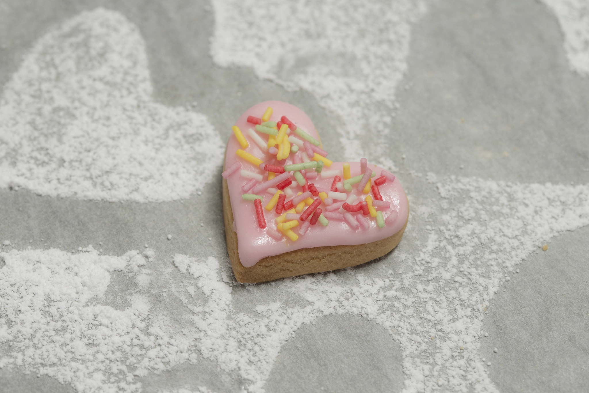Canon EF 100mm F2.8 Macro USM sample photo. Close-up of baked valentine heart with pink icing photography